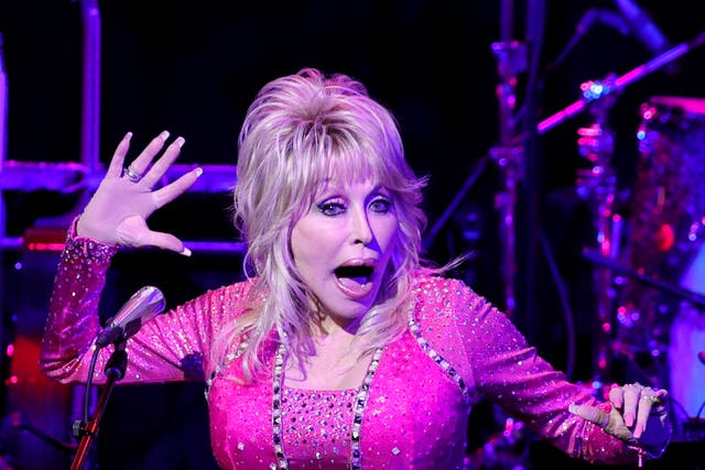 <p>Dolly Parton performing in October 2021</p>