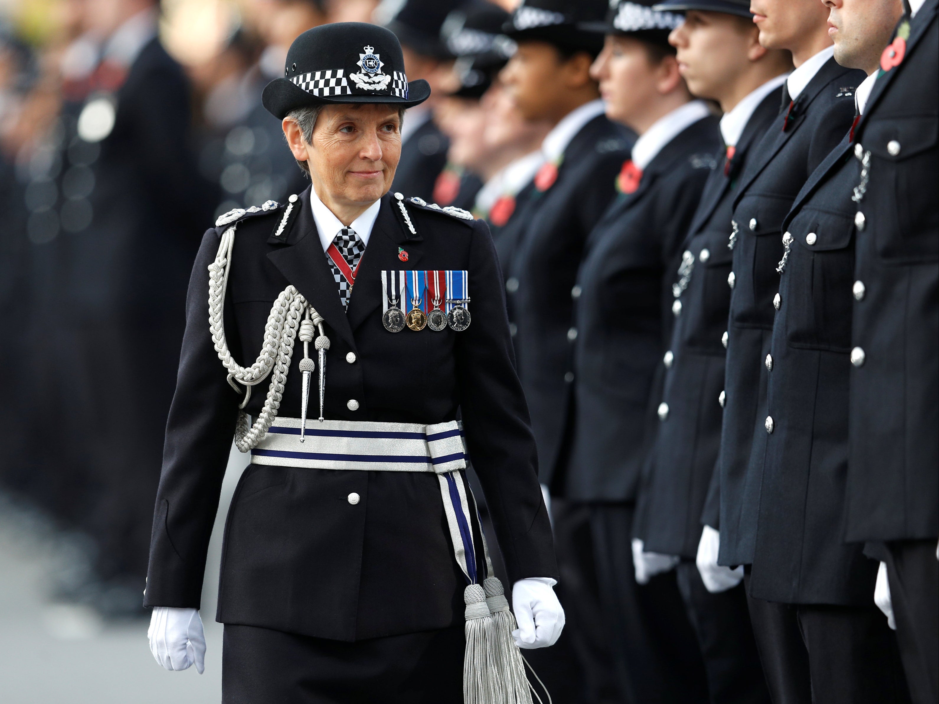 Metropolitan Police Commissioner Cressida Dick inspects police cadets at a passing out parade in Hendon