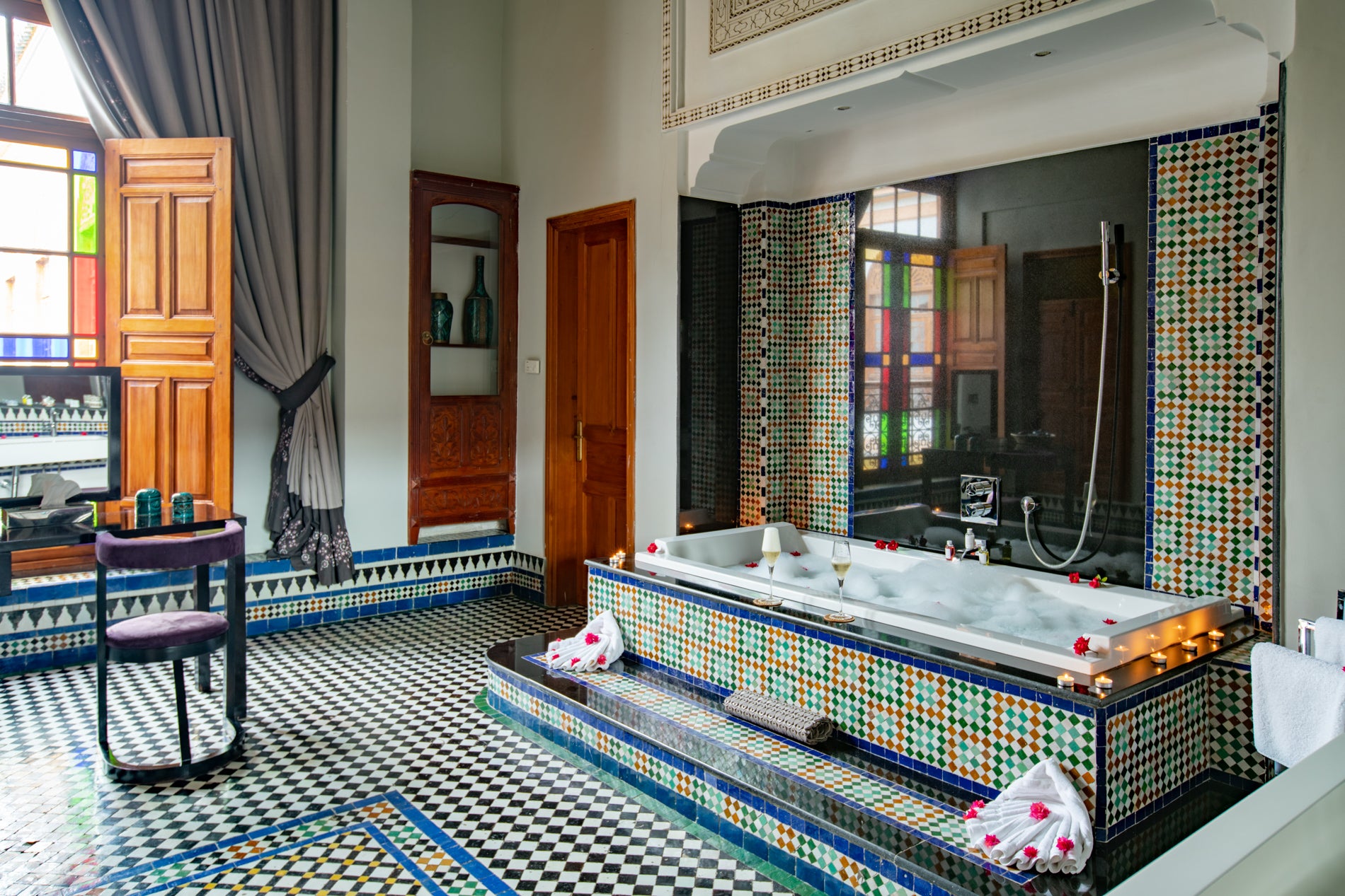 Bathrooms are swathed in intricate tilework