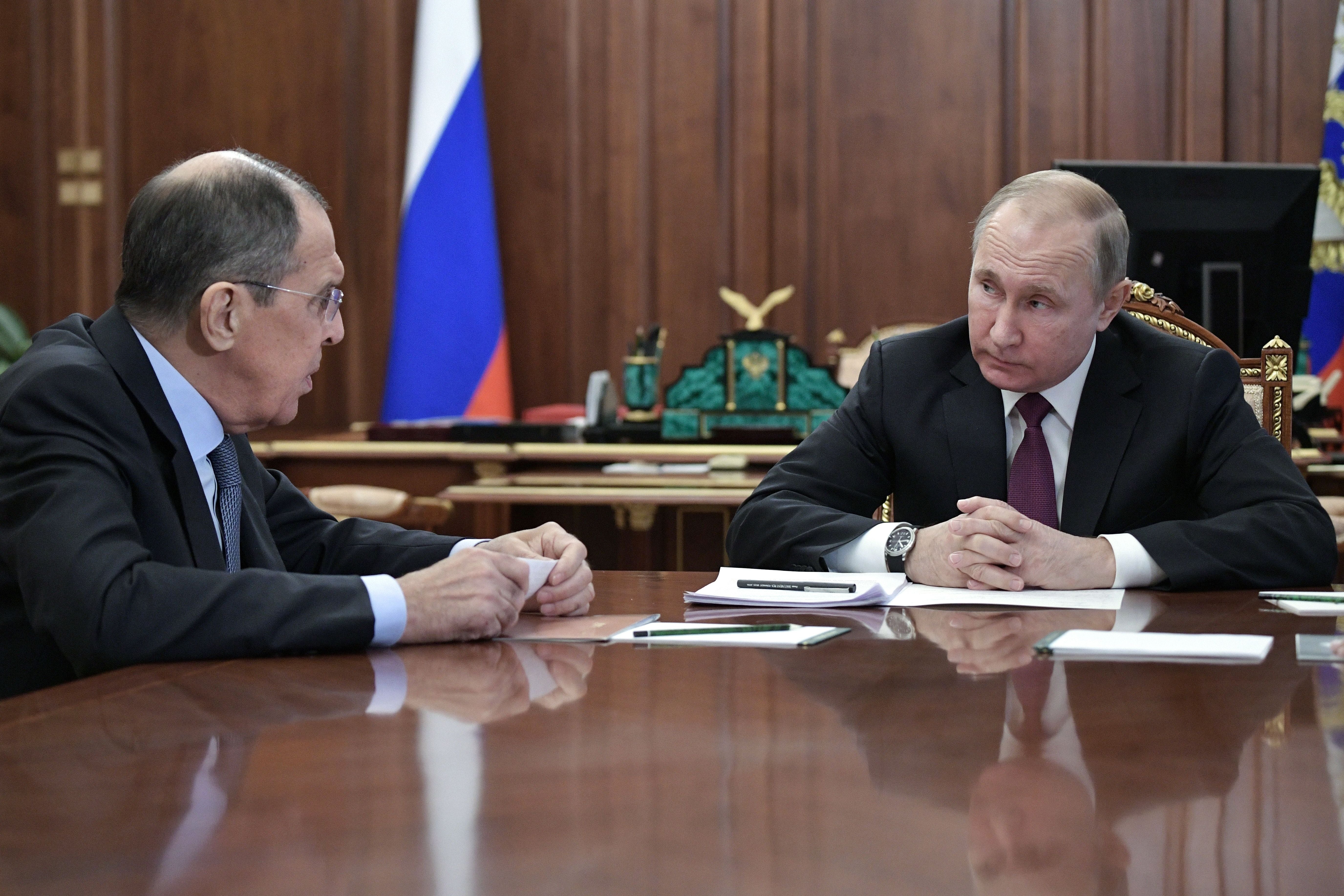 File photo: Russia’s President Vladimir Putin (R) attends a meeting with Russia’s Foreign Minister Sergei Lavrov (L) in Moscow, 2 February 2019