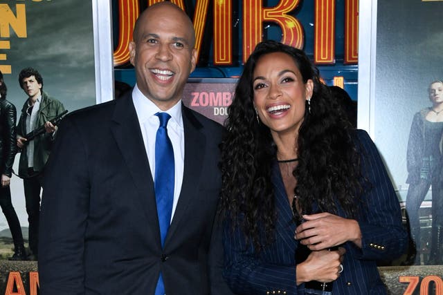 <p>Cory Booker and Rosario Dawson attend the premiere of Zombieland: Double Tap on 10 October 2010 in Westwood, California</p>