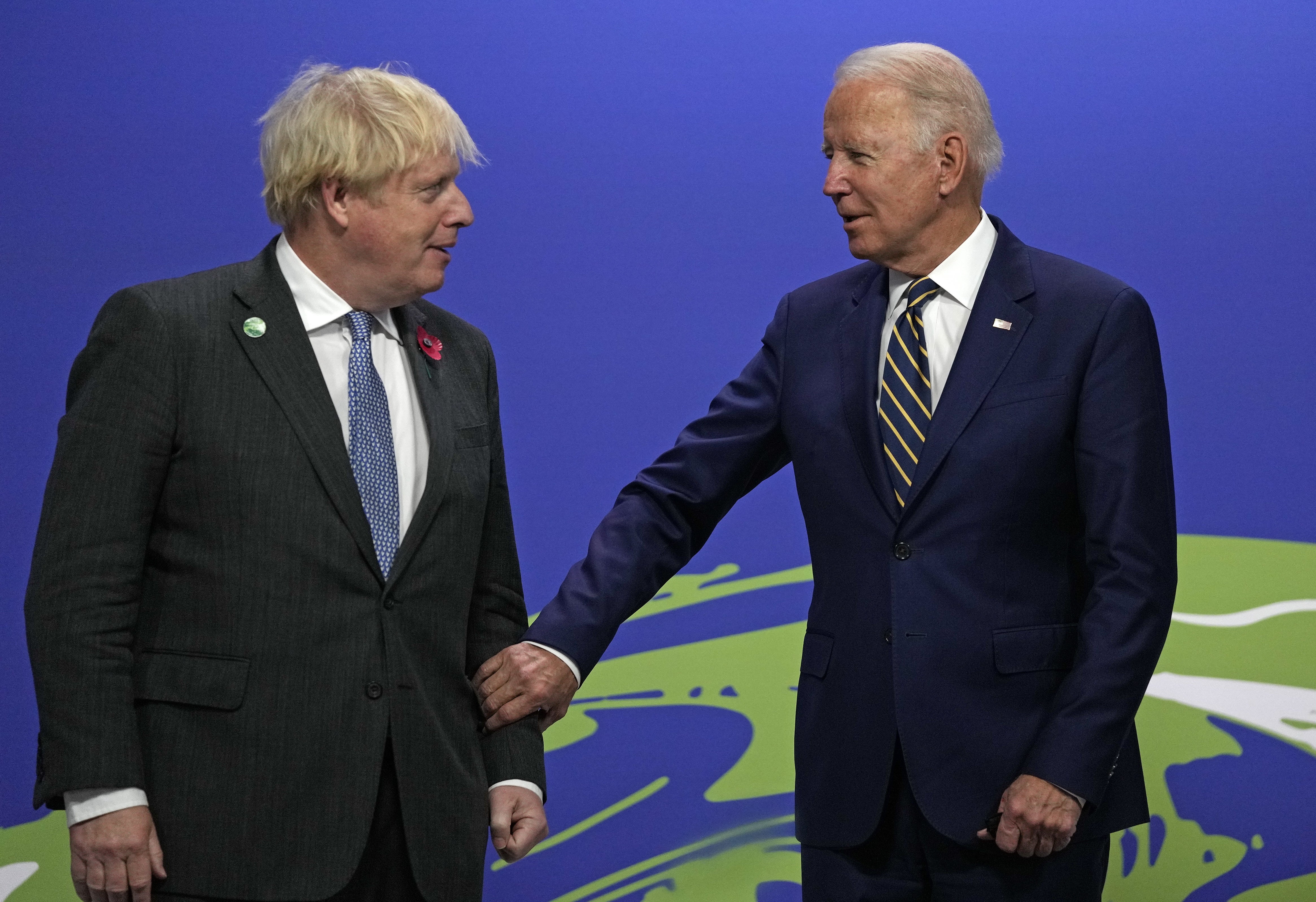 Boris Johnson and Joe Biden (Alastair Grant/PA)