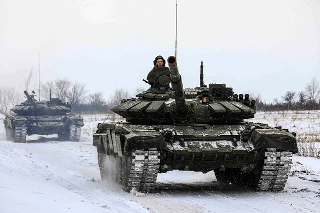 <p>Russian tanks roll on the field during a military drills in Leningrad </p>