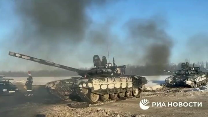 Russian tanks appear to flee Ukrainian border amid de-escalation hopes ...