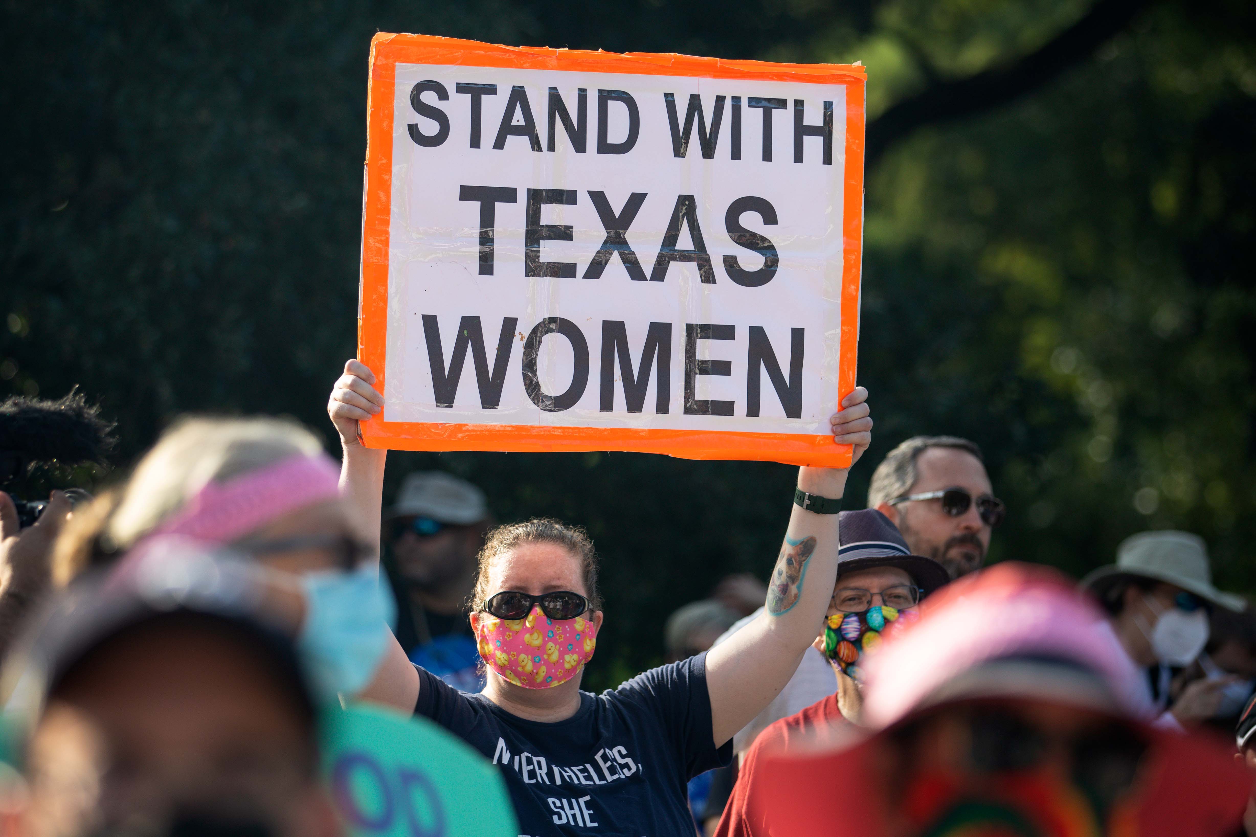 Demonstrators rally against anti-abortion and voter suppression laws at the Texas State Capitol on October 2, 2021 in Austin, Texas. The Women's March and other groups organized marches across the country to protest the new abortion law in Texas. (Photo by Montinique Monroe/Getty Images)