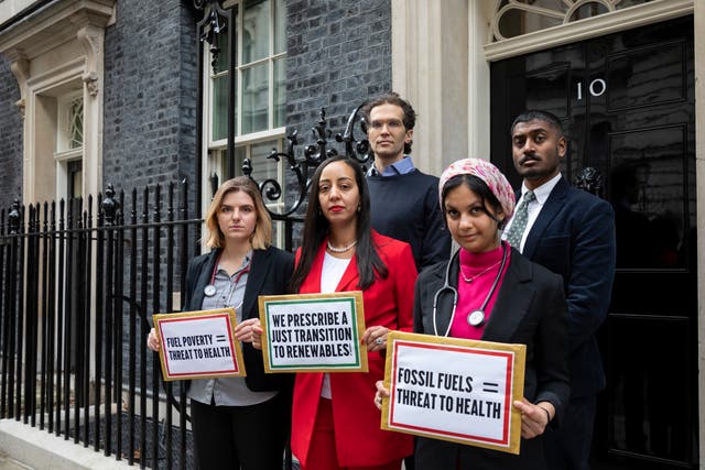 <p>Health professionals hand letter to Downing Street urging UK to end reliance on fossil fuels</p>