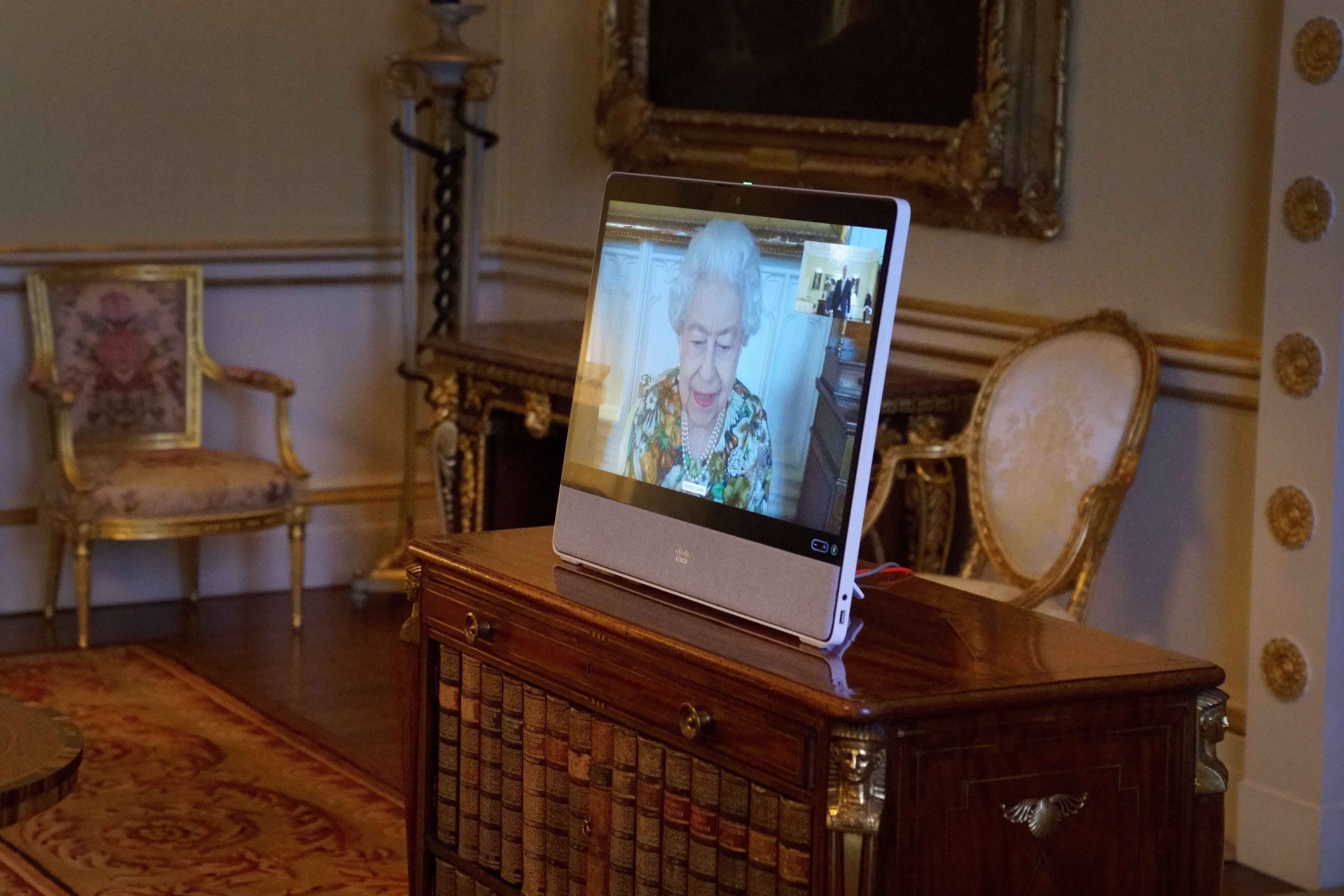 The Queen appearing on screen during the audiences (Victoria Jones/PA)