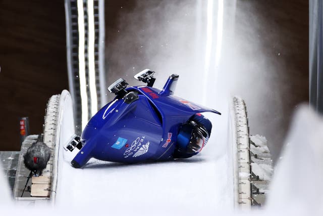 <p>Brad Hall and Nick Gleeson of Team Great Britain crash during the 2-man Bobsleigh Heat 3</p>
