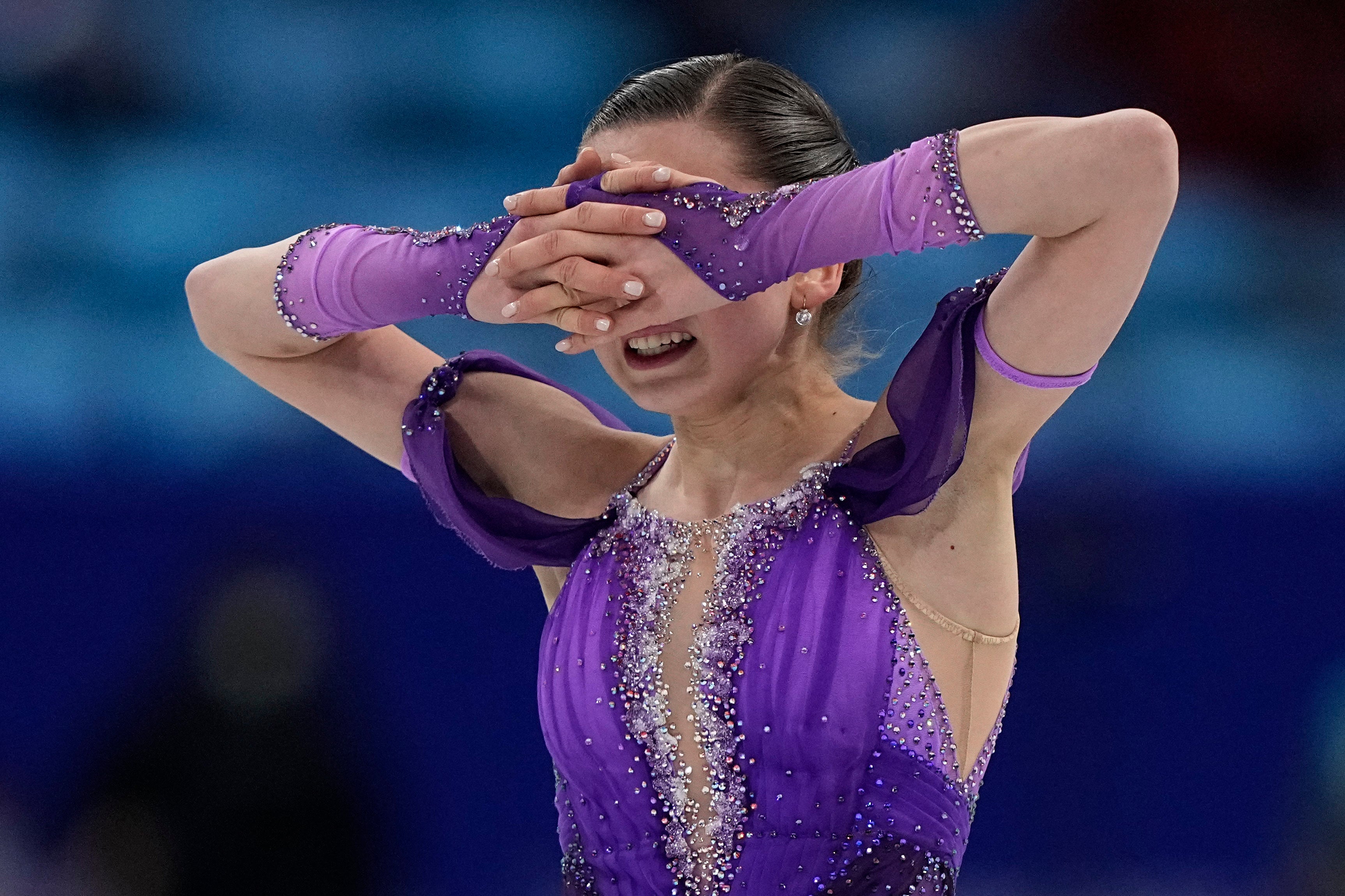 Kamila Valieva, of the Russian Olympic Committee, reacts in the women's short program during the figure skating