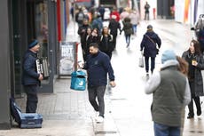 Traders hope easing of Covid rules is ‘beginning of the end’ of pandemic