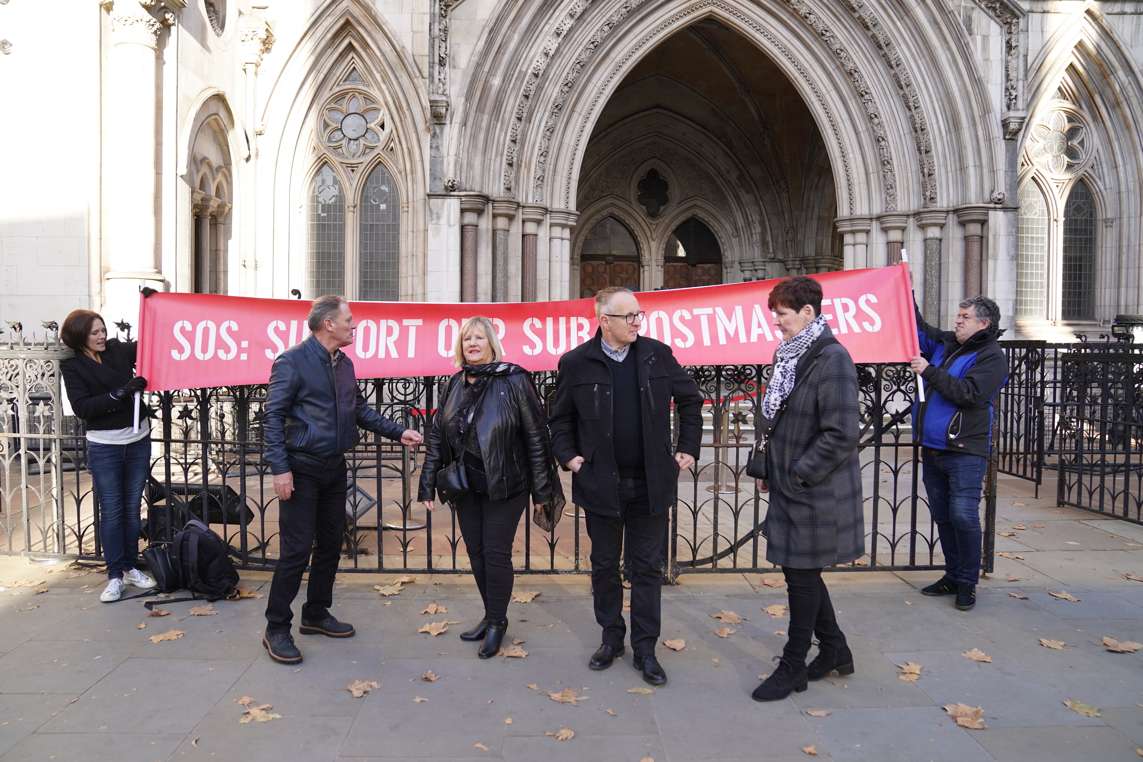 Former subpostmasters outside the the Royal Courts of Justice, London (Stefan Rousseau/PA)