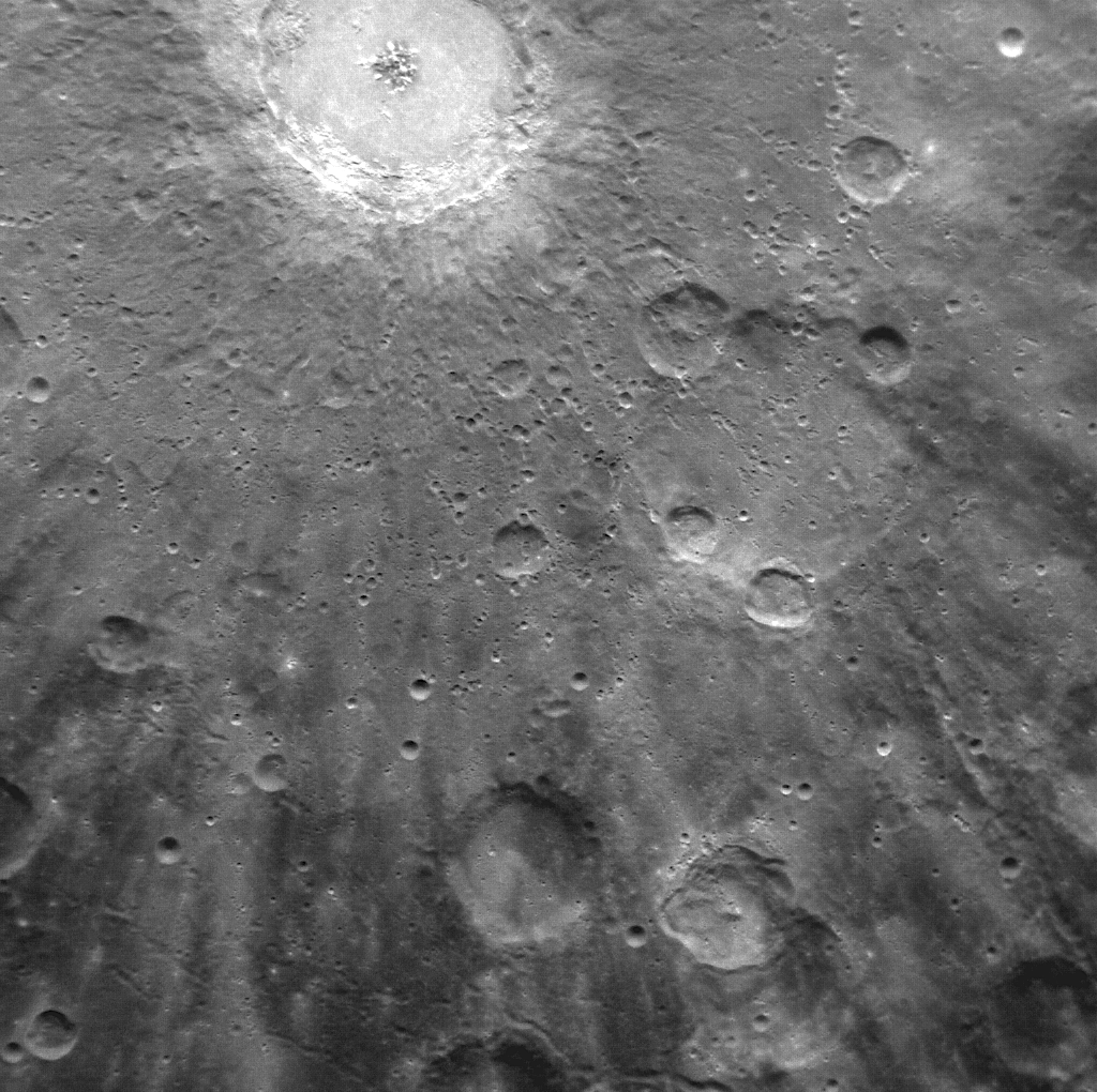Secondary impact craters radiate out from the primary Debussy crater on Mercury
