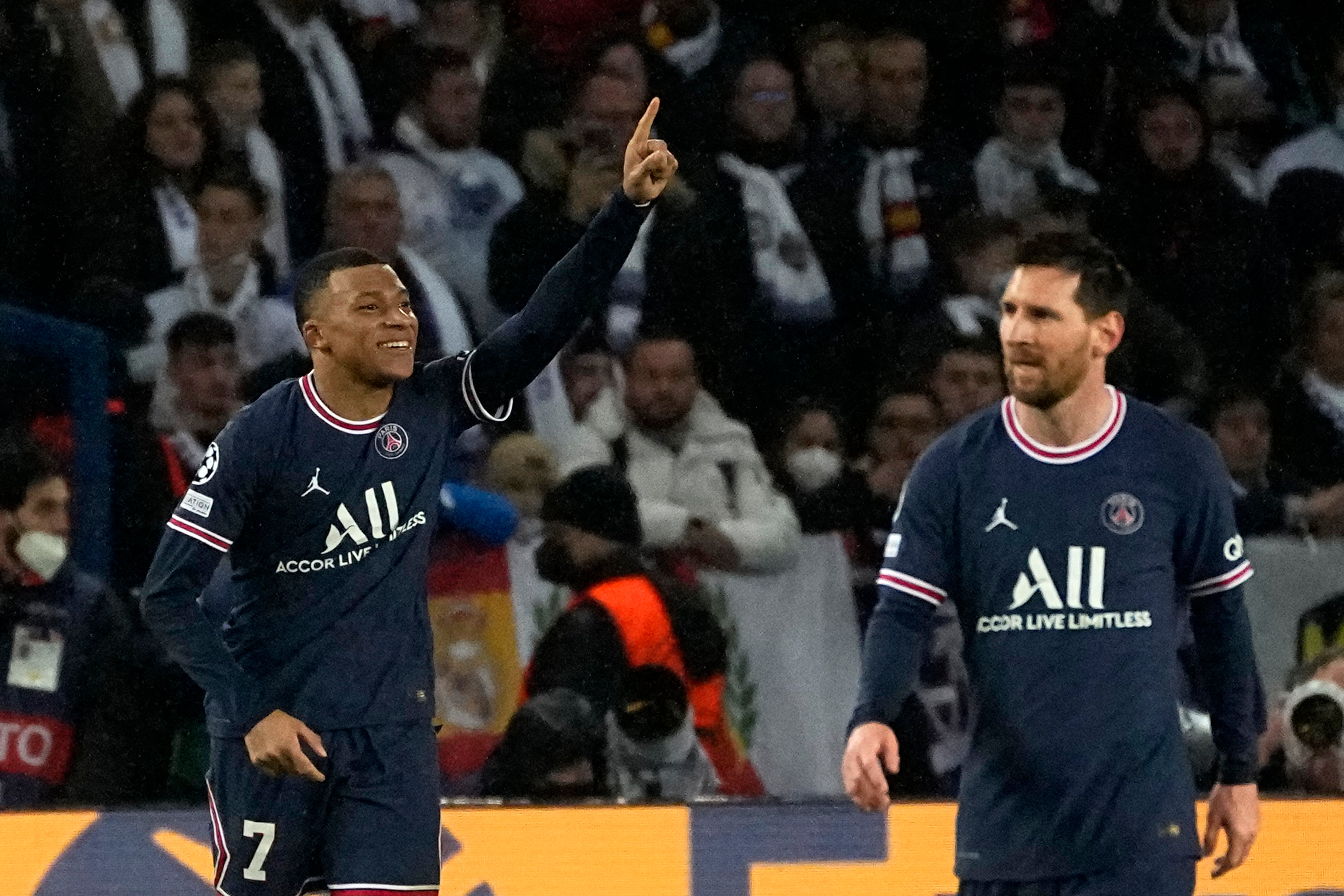Kylian Mbappe celebrates PSG’s opening goal with Lionel Messi