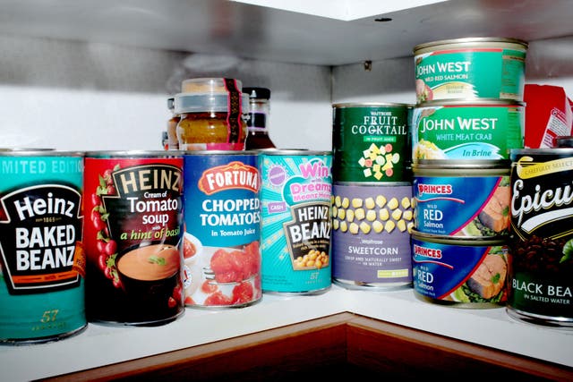 Britons have been told to stock up on tinned food (Alamy/PA)