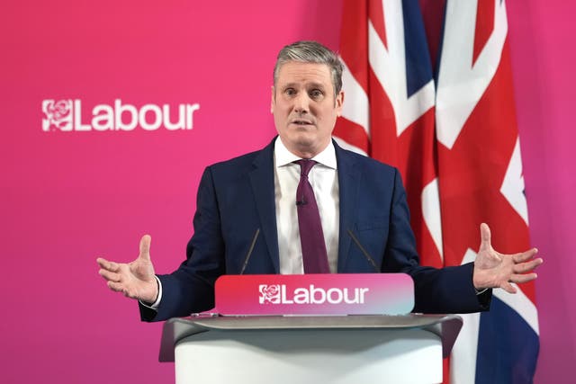 <p>Keir Starmer regularly festoons his public appearances with flags</p>