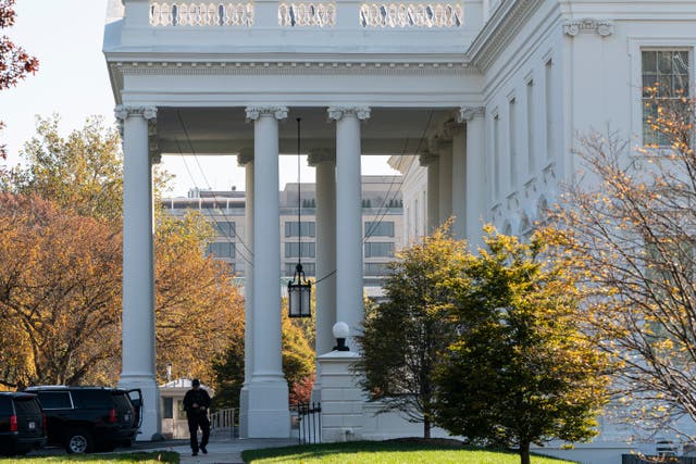 <p>A Secret Service officer patrols at the White House on November 9, 2020 in Washington, DC (Photo by Joshua Roberts/Getty Images)</p>