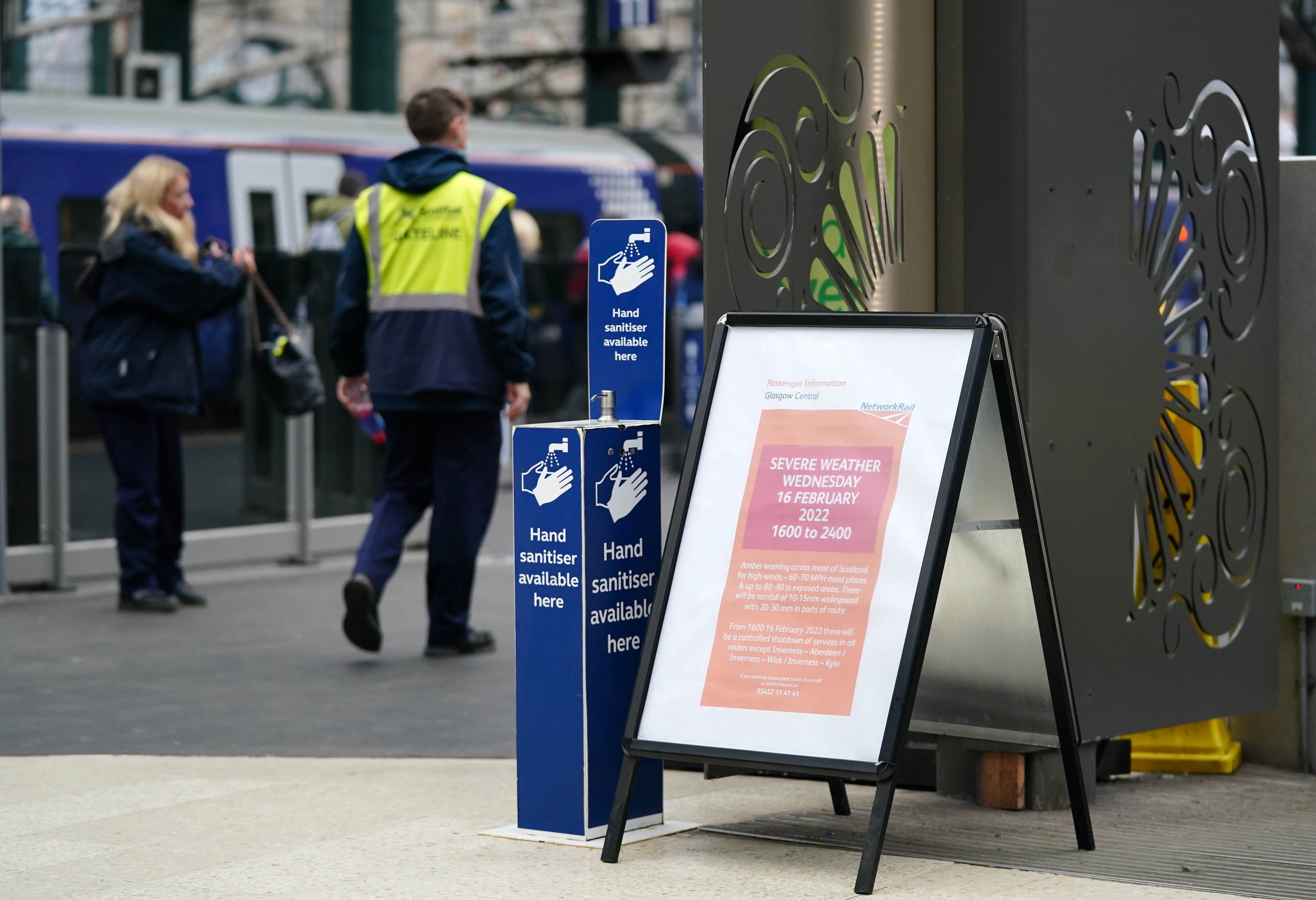 A weather warning sign at Glasgow Central Station as Storm Dudley sweeps in (Jane Barlow/PA)