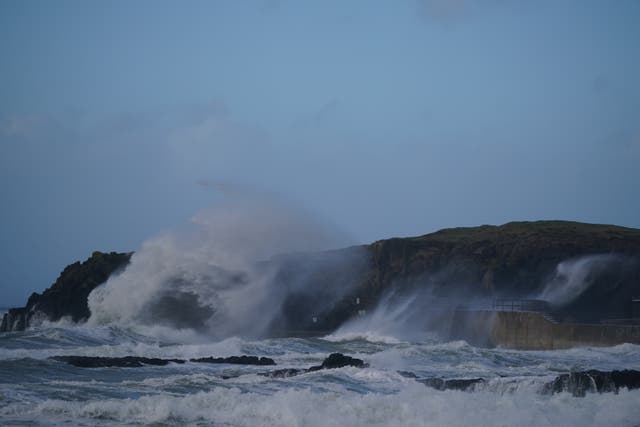 Strong winds and heavy rain have swept through the country (Niall Carson/PA)