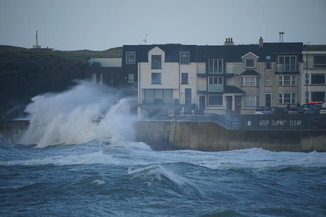 <p>Waves hit the sea wall at Portstewart in County Londonderry, Northern Ireland in Storm Dudley </p>