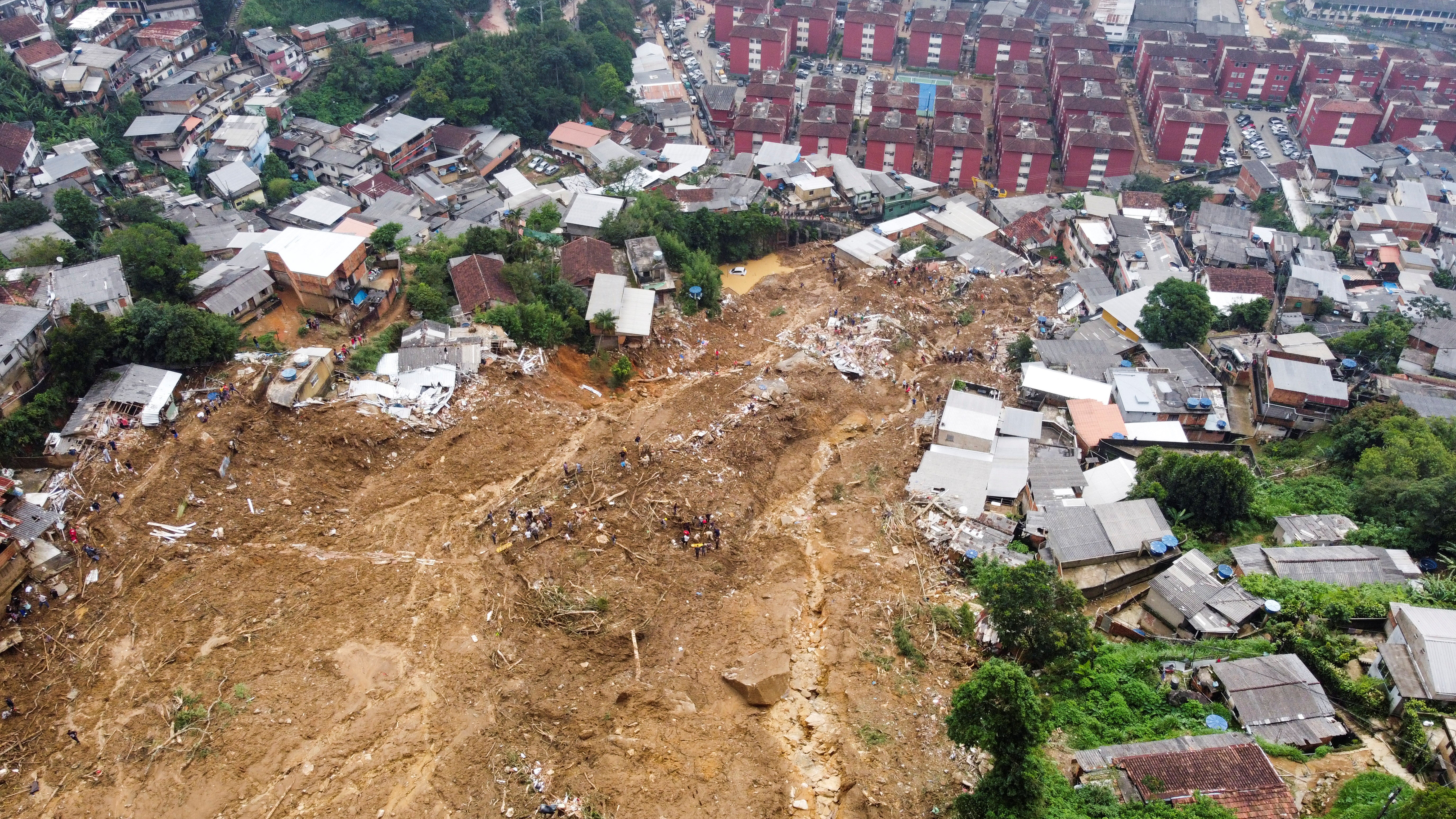 An overview of a site of a mudslide at Morro da Oficina after pouring rains in Petropolis, Brazil on February 16, 2022. The photograph is taken with a drone