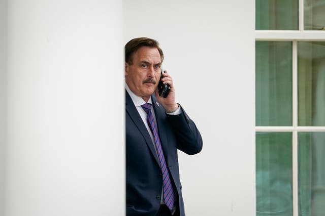 <p>MyPillow CEO Mike Lindell waits outside the West Wing of the White House before entering on January 15, 2021 in Washington, DC.</p>