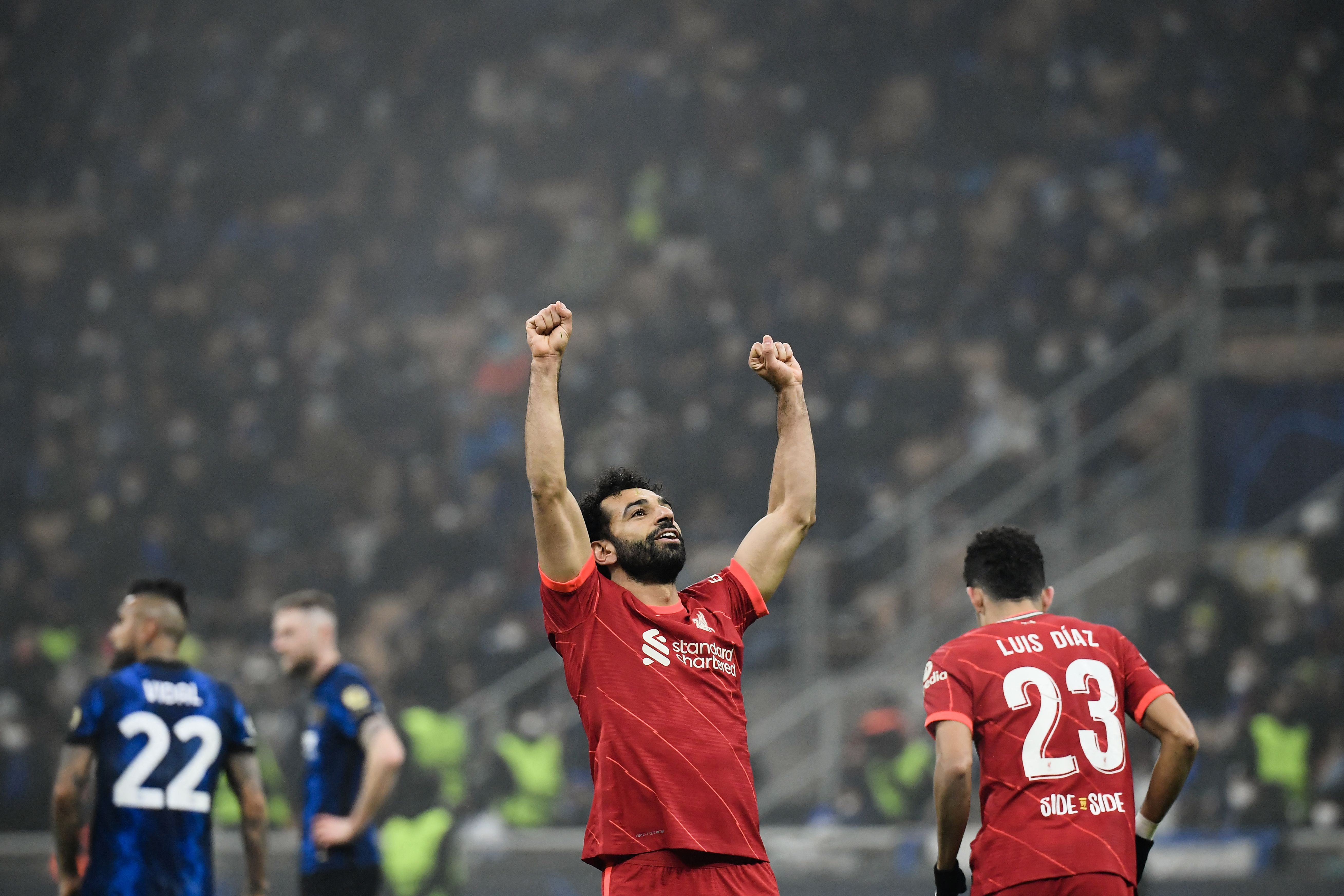 Goalscorer Mohamed Salah celebrates in front of Liverpool fans