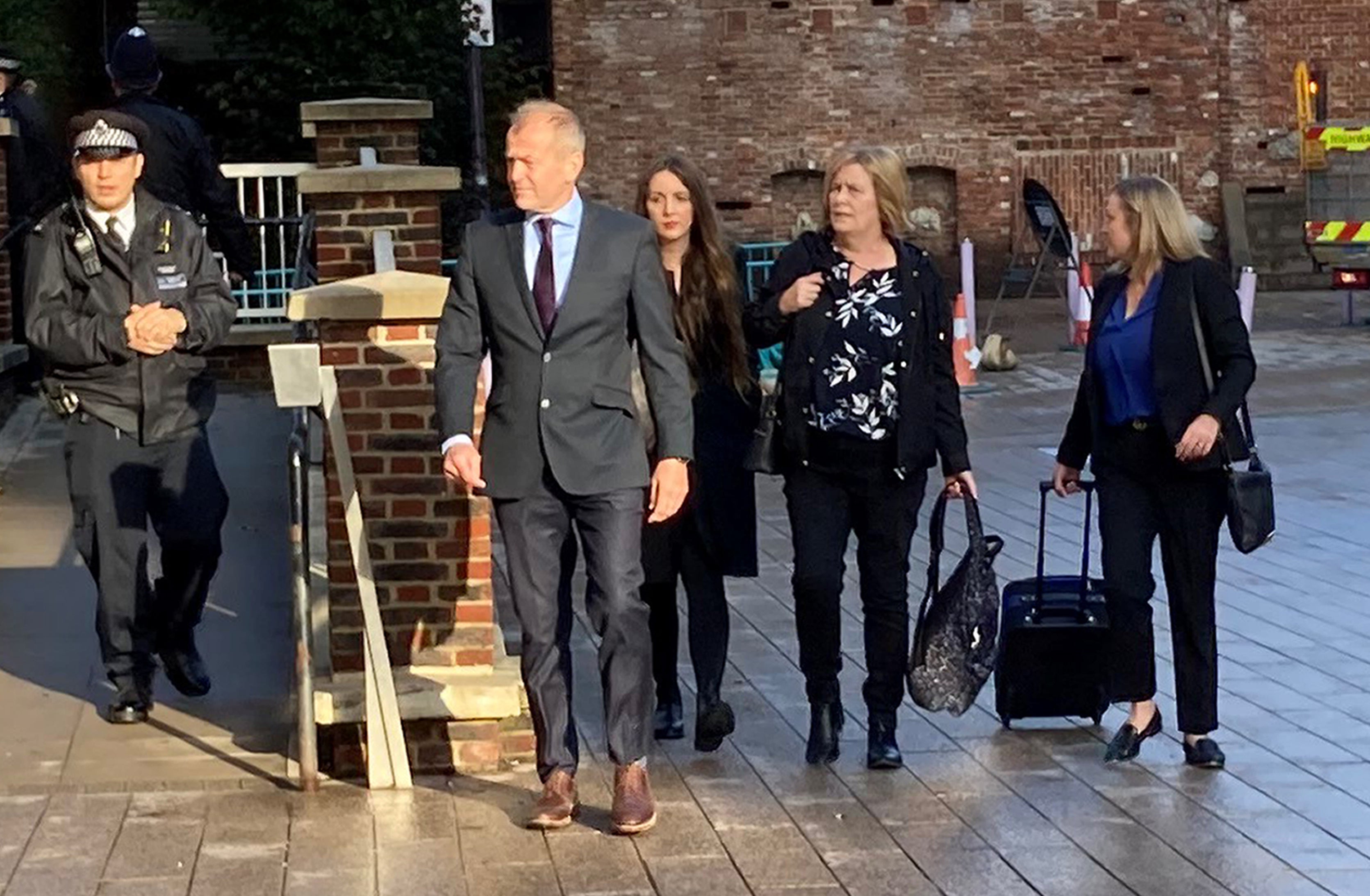 Sarah Sak, second right, arriving at Barking Town Hall, London, for the inquests into the deaths of the victims of Stephen Port (Emily Pennink/PA)