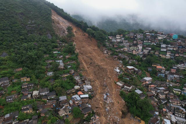 <p>Heavy rains set off mudslides and floods in a mountainous region of Rio de Janeiro state, killing multiple people</p>