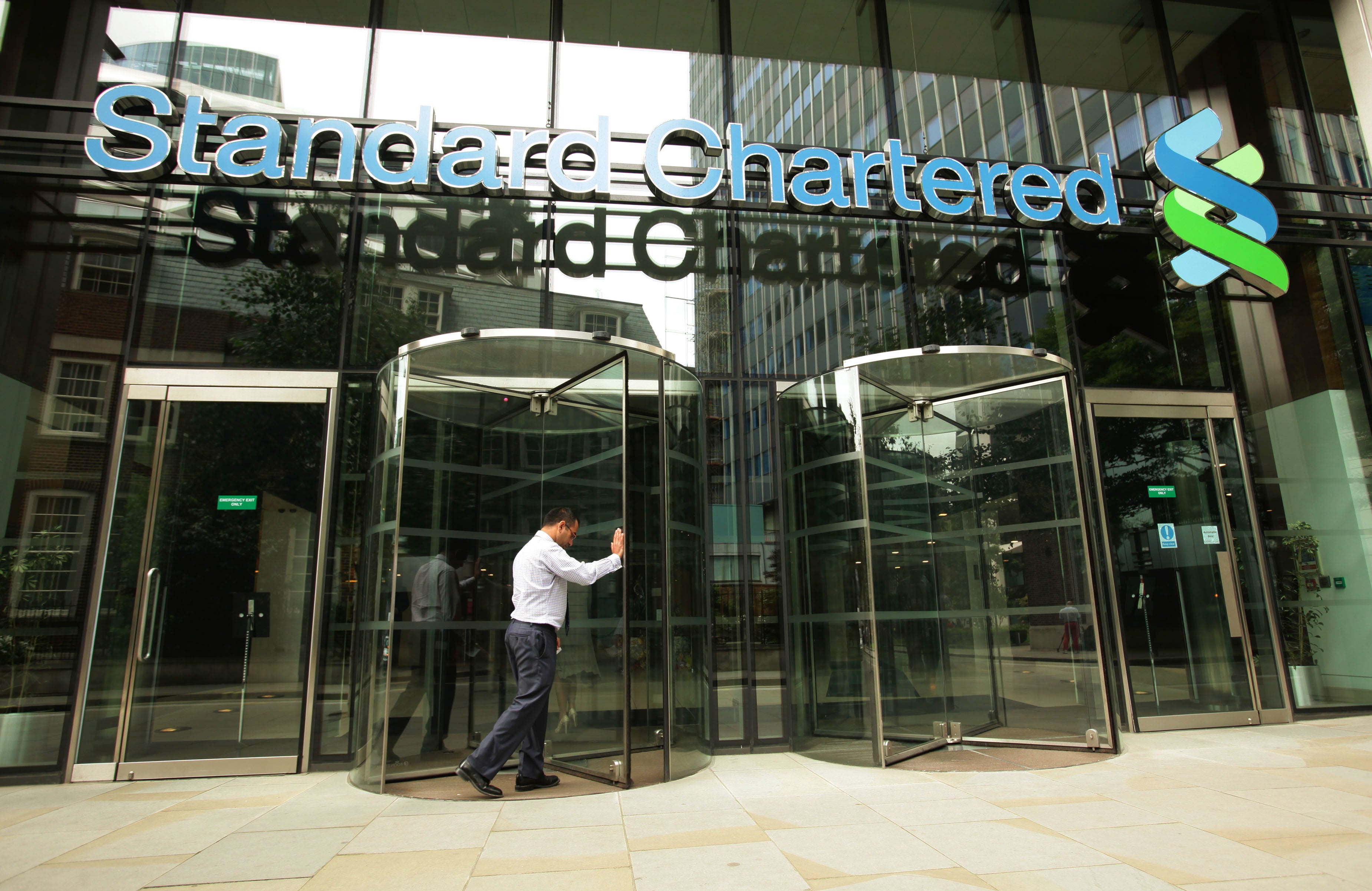 Emerging markets-focused bank Standard Chartered has unveiled more than one billion US dollars (£736 million) in shareholder returns (Yui Mok/PA)