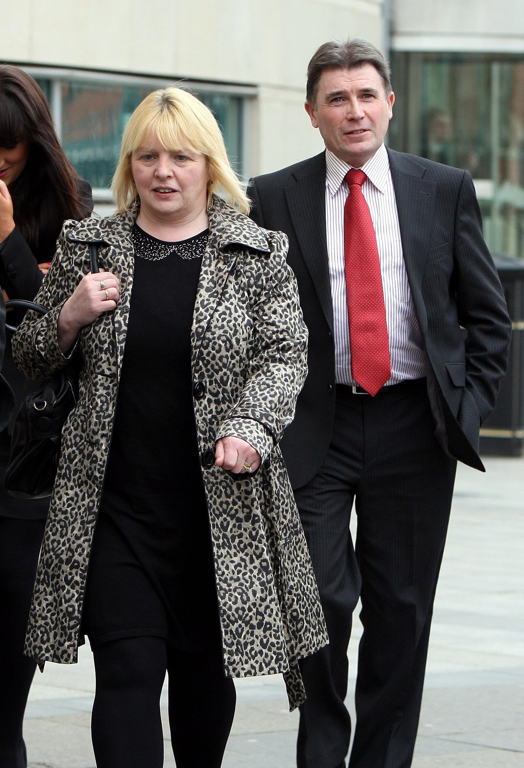 Martin McCaughey’s sister Sally Gribben and Philip O’Neill, brother-in-law of Dessie Grew, at an inquest into their deaths at Laganside Court, Belfast (Paul Faith/PA)