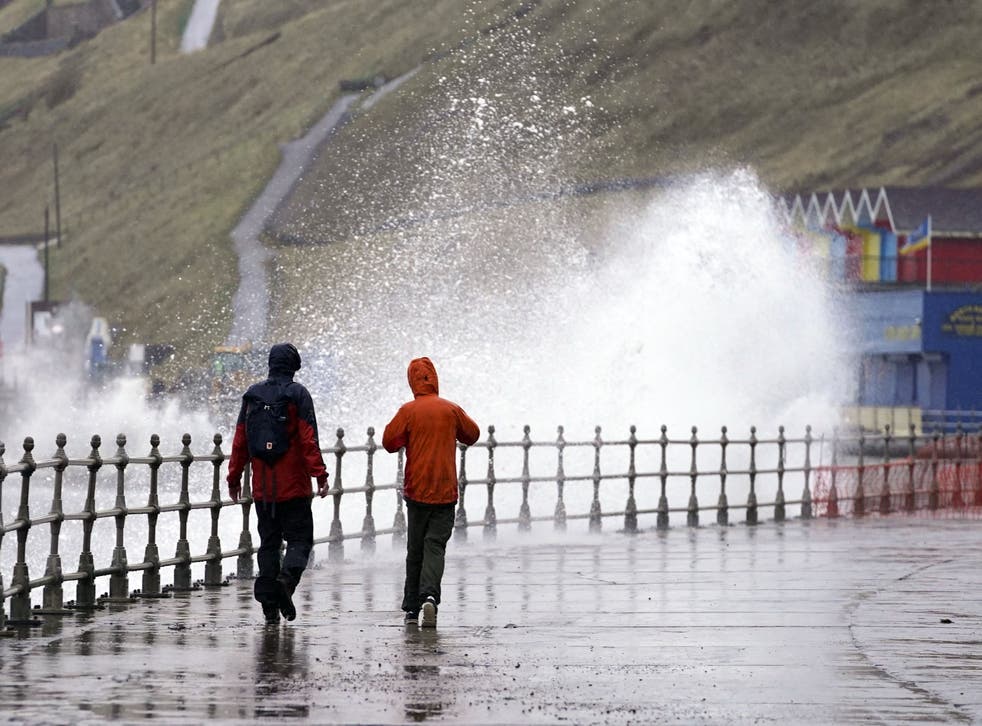 Large waves hit the sea wall at Whitby as Storm Dudley swept in (Danny Lawson/PA)