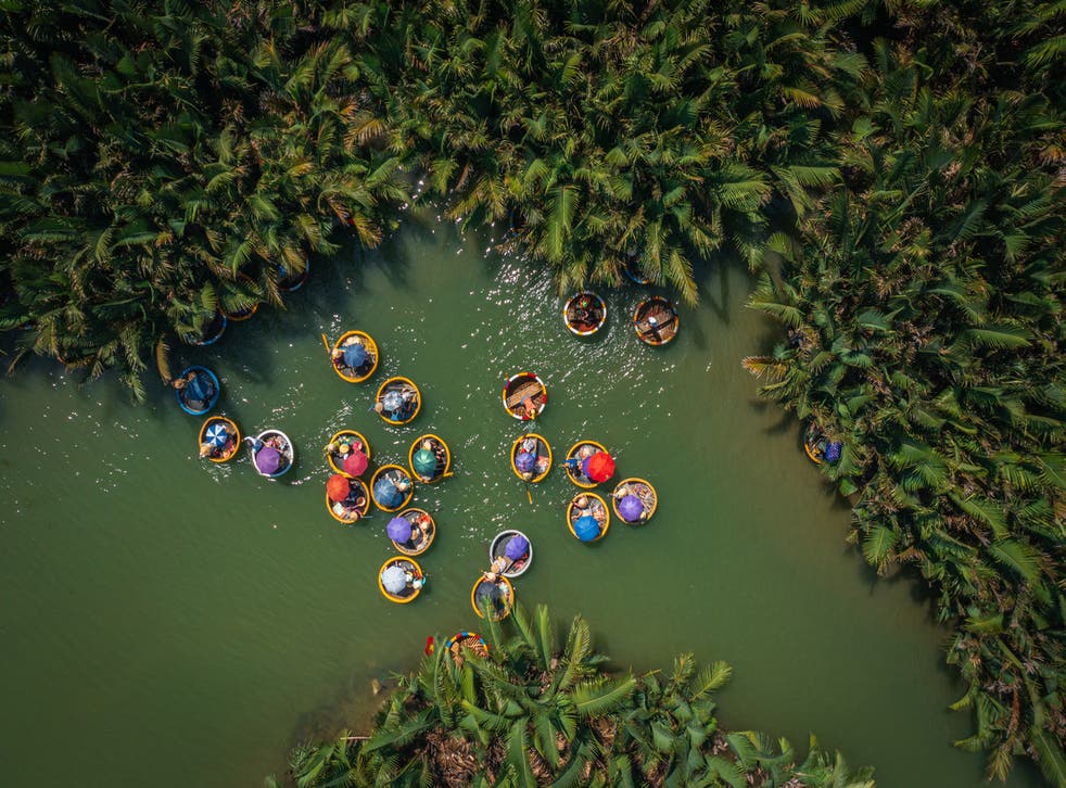 <p>A basket boat tour in Bay Mau nipa palm jungle in Quang Nam province, central Vietnam</p>