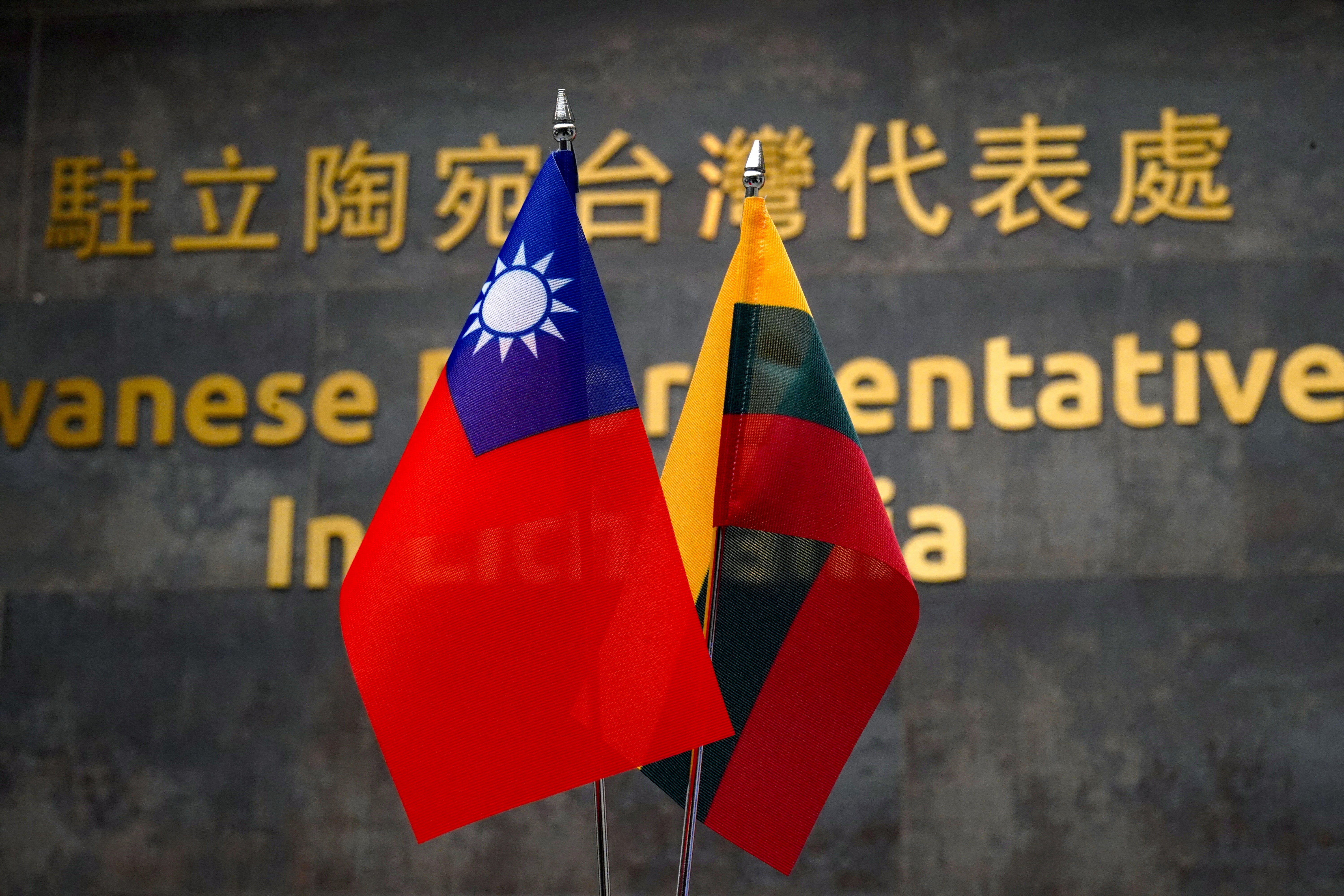 Taiwanese and Lithuanian flags are displayed at the Taiwanese Representative Office in Vilnius, Lithuania