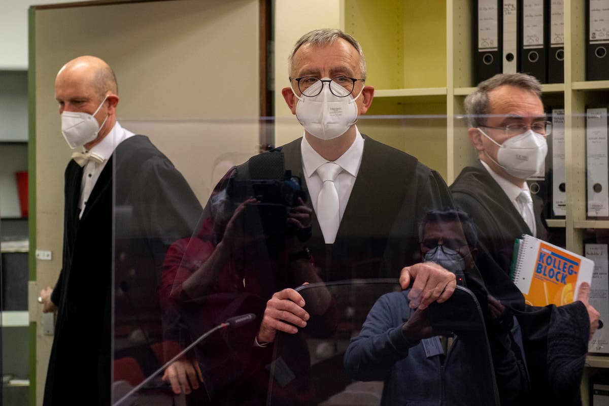 Russian man charged with espionage goes on trial in Germany Russian man charged with espionage goes on trial in Germany