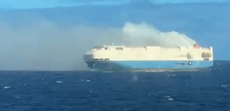 Cargo ship carrying hundreds of Porsches left to burn in Atlantic after crew flee
