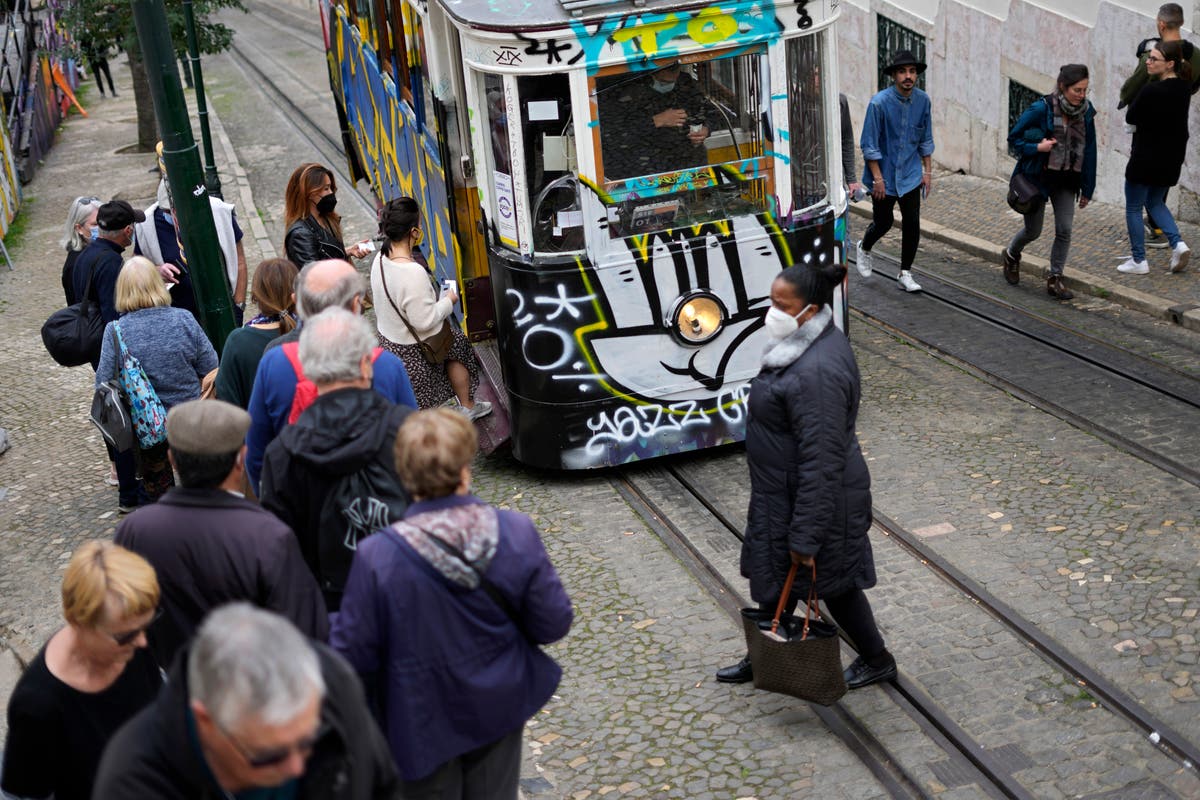 Portugal scraps some virus restrictions as pandemic abates 