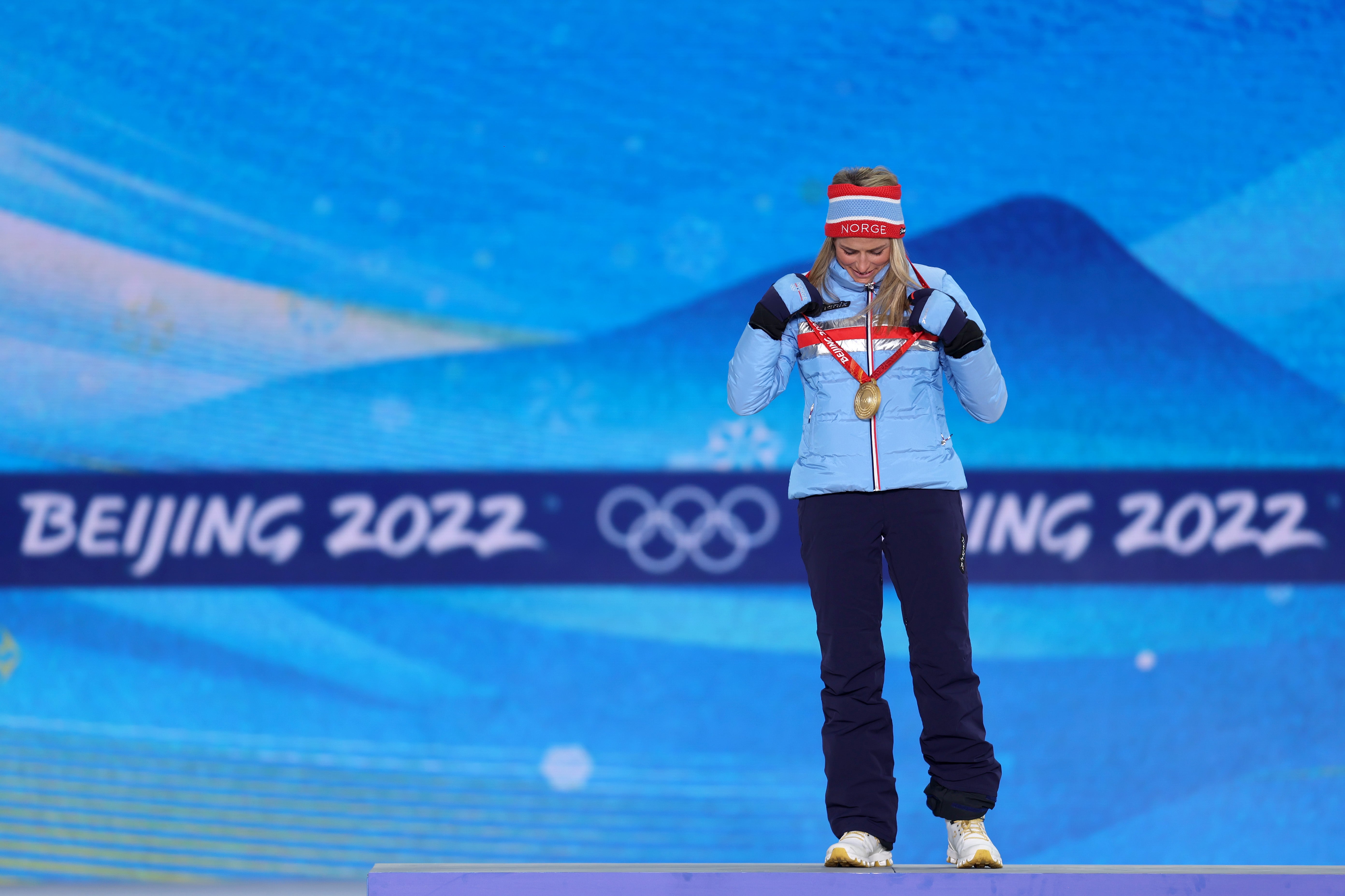 Gold medallist, Therese Johaug of Team Norway stands on the podium during the Women's 10km Classic medal ceremony on Day 6 of the Beijing 2022 Winter Olympic Games
