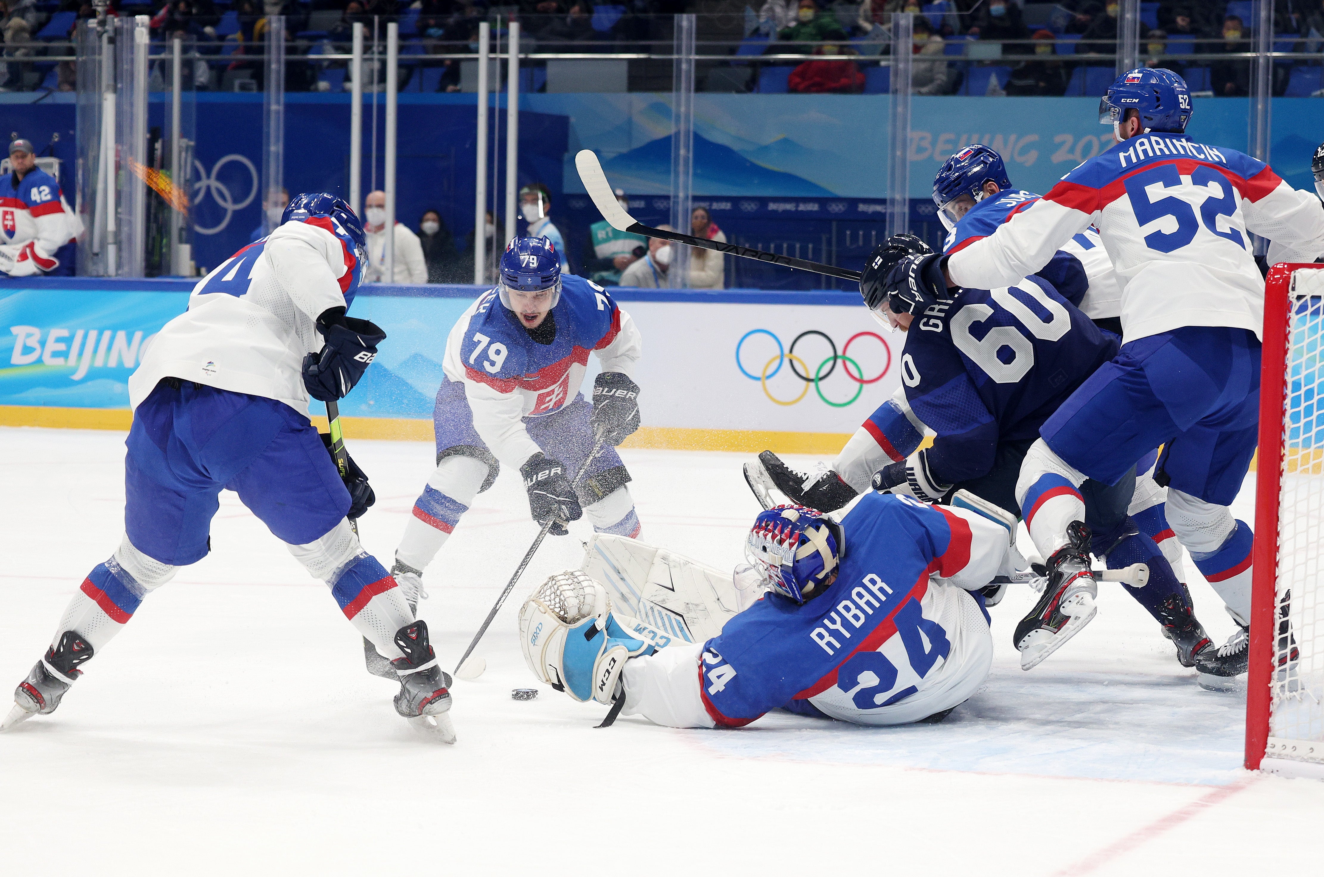 Finland play against Slovakia during men’s ice hockey splayoff semifinal match on day 14