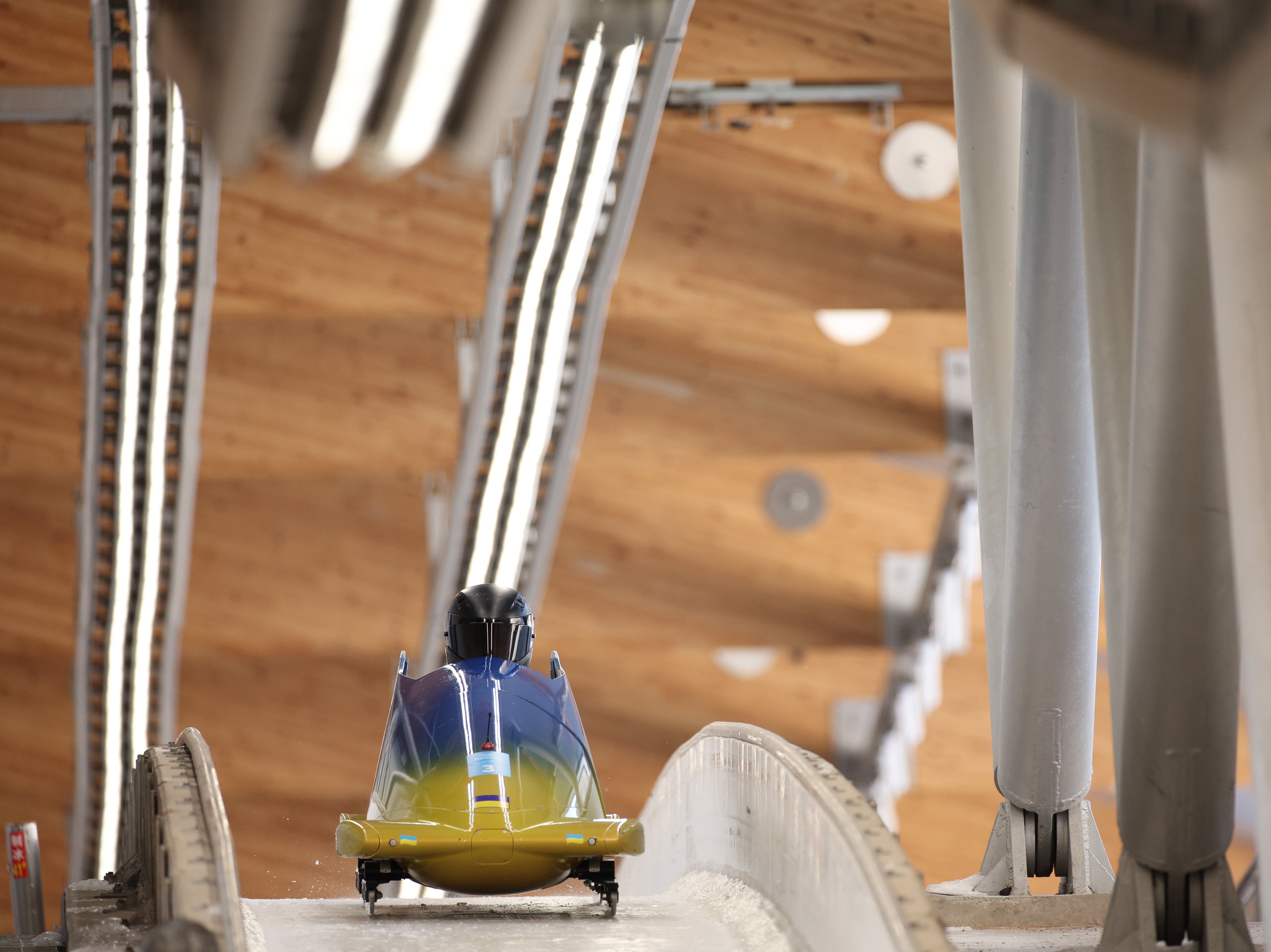 Lidiia Hunko of Team Ukraine slides during the Women's Monobob Bobsleigh Heat 3 on day 10 of Beijing 2022 Winter Olympic Games