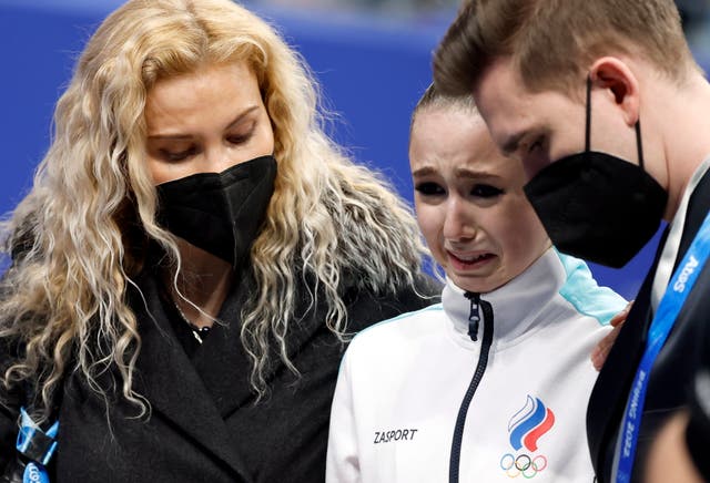 <p>Kamila Valieva (C) of Russian Olympic Committee cries next her coach Eteri Tutberidze</p>
