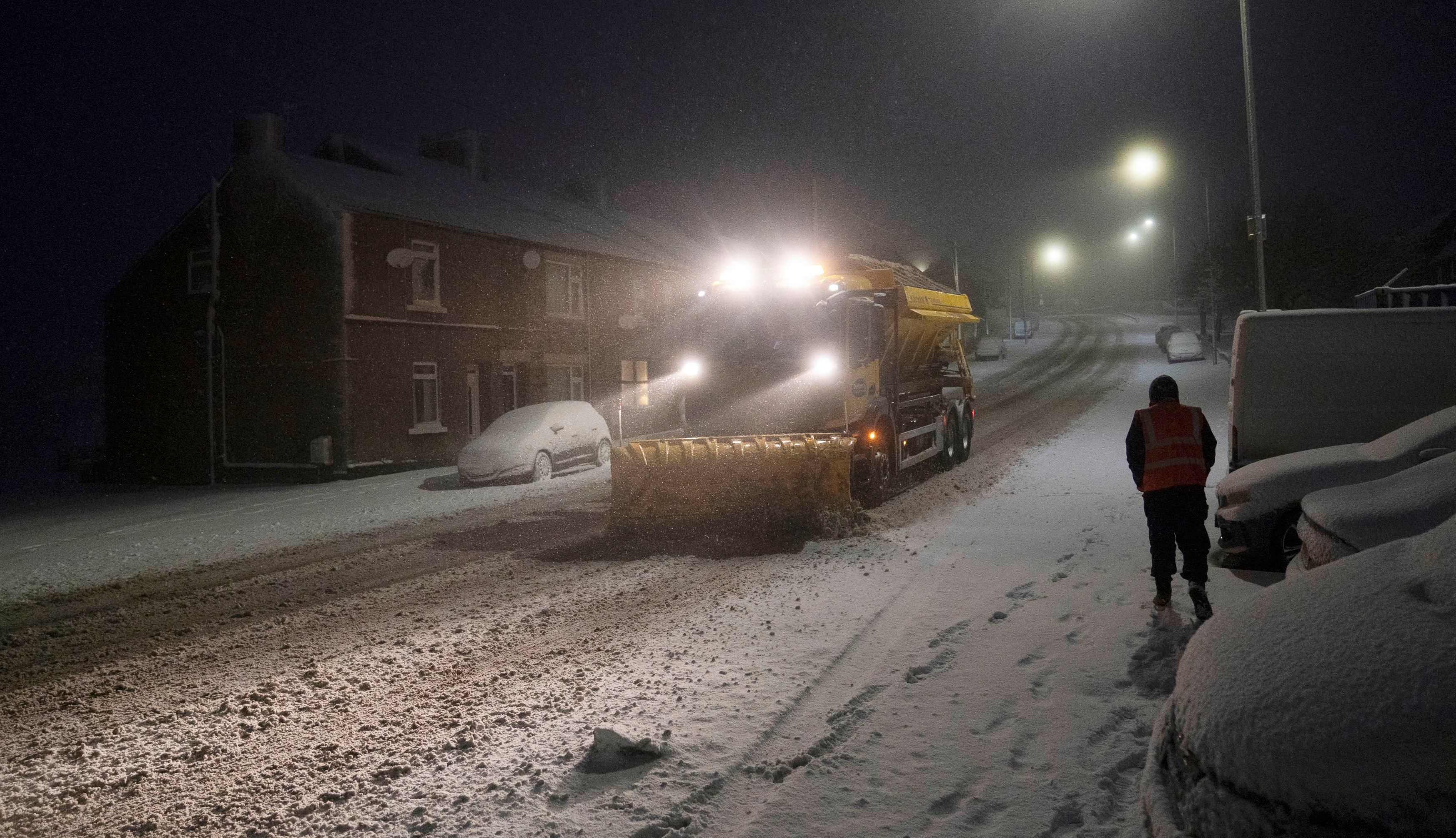 A snowplough clears a road in Tow Law, County Durham