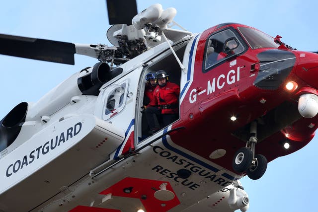 A coastguard helicopter was involved in the rescue (Andrew Milligan/PA)