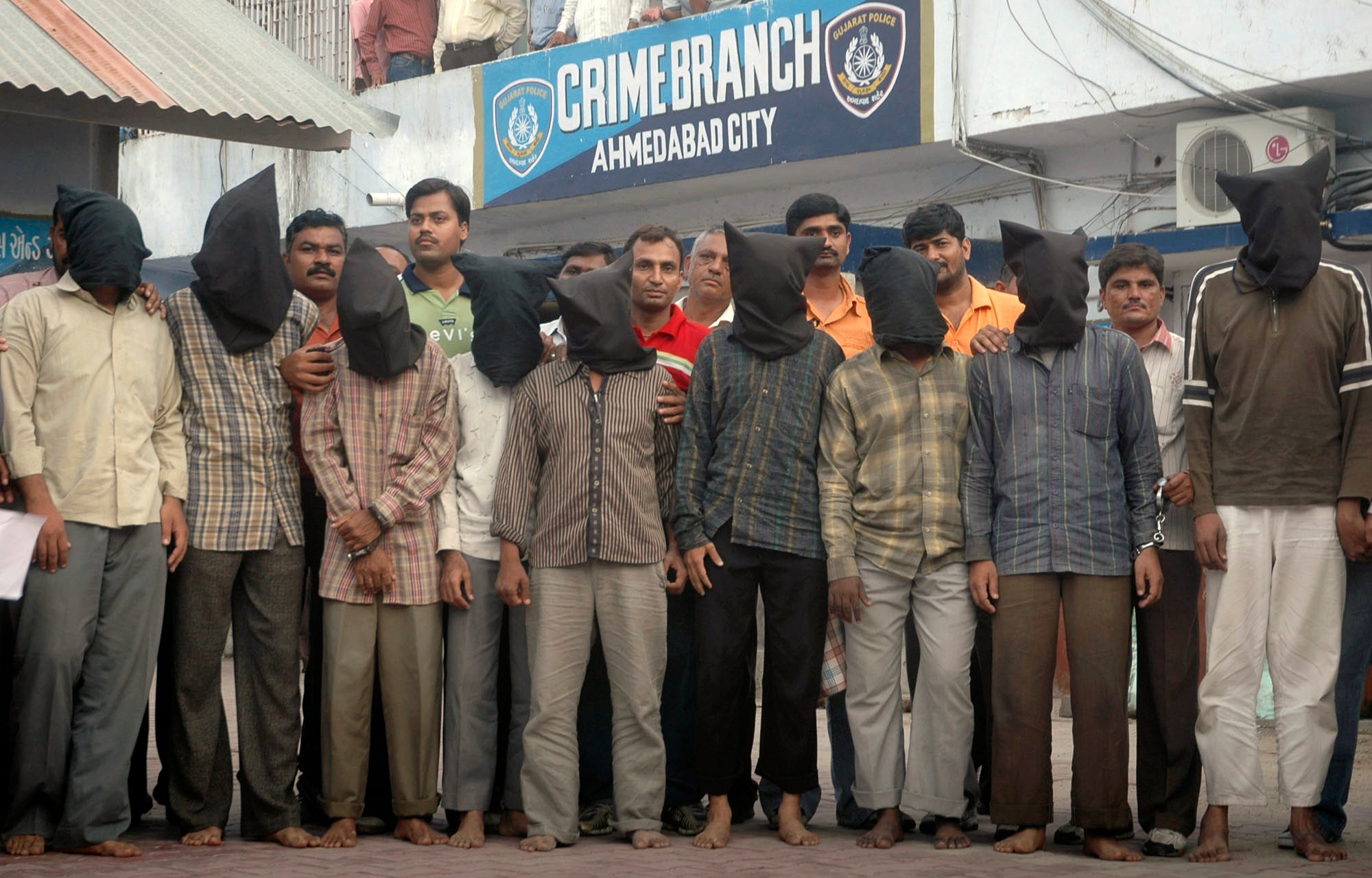 <p>File photo: Nine men arrested by the Ahmedabad crime branch for conducting a series of bombings in the city in 2008 </p>