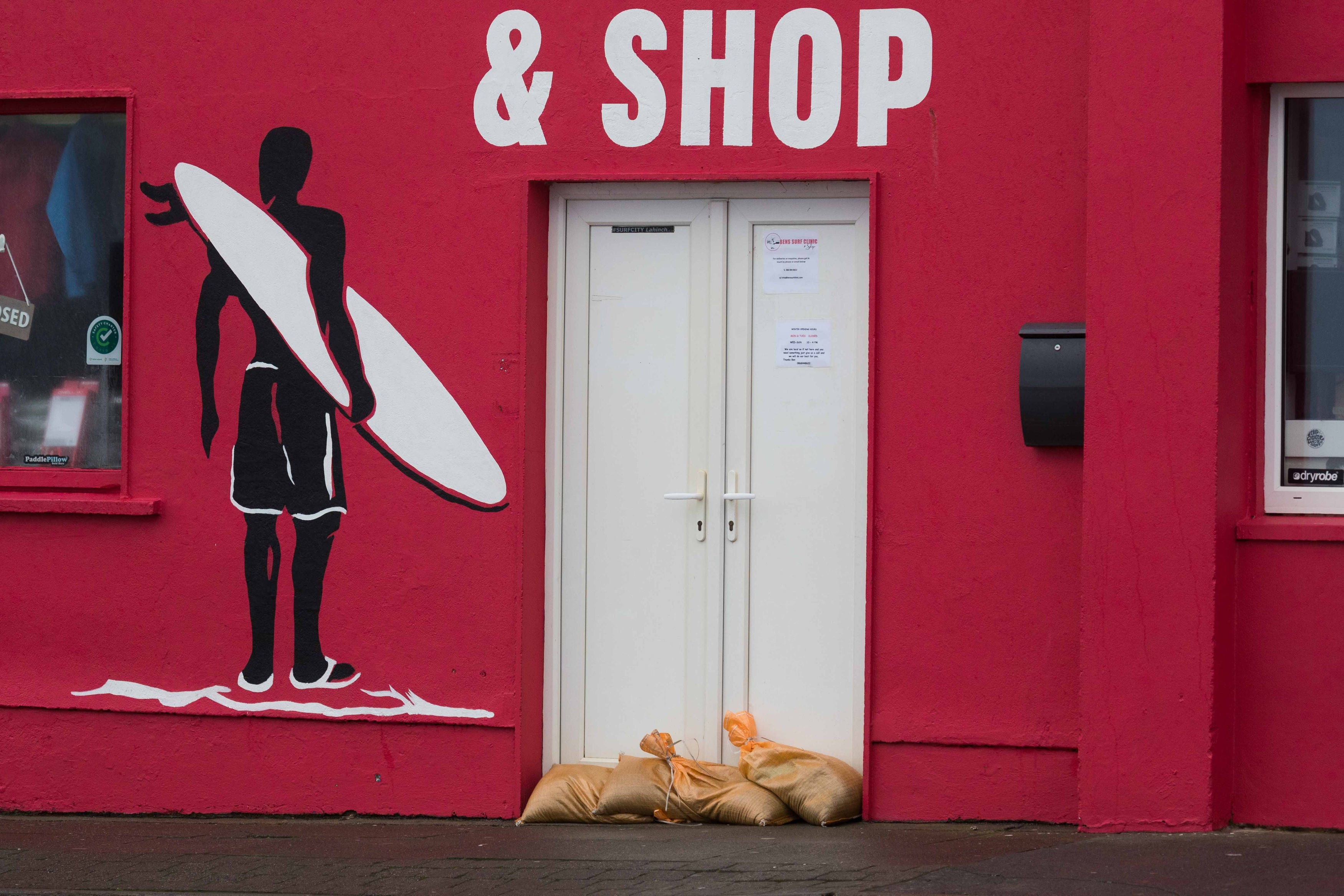 Sandbags protect a property in Lahinch, Co Clare, as Storm Eunice continues to rage across Ireland