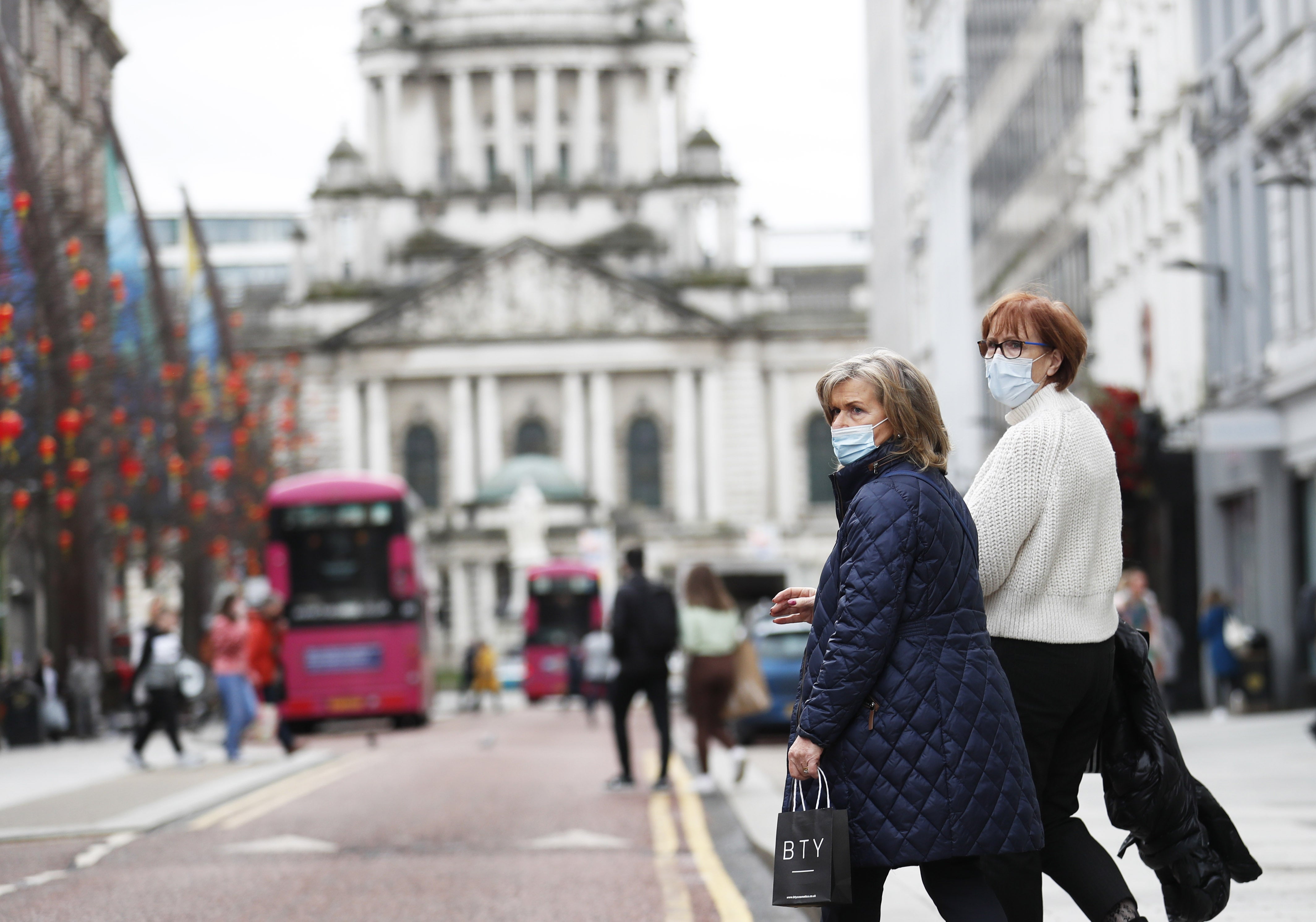 Shoppers go about their business in Belfast City Centre as Coronavirus legal restrictions are being lifted in Northern Ireland and being replaced with guidance.. (Peter Morrison/PA)