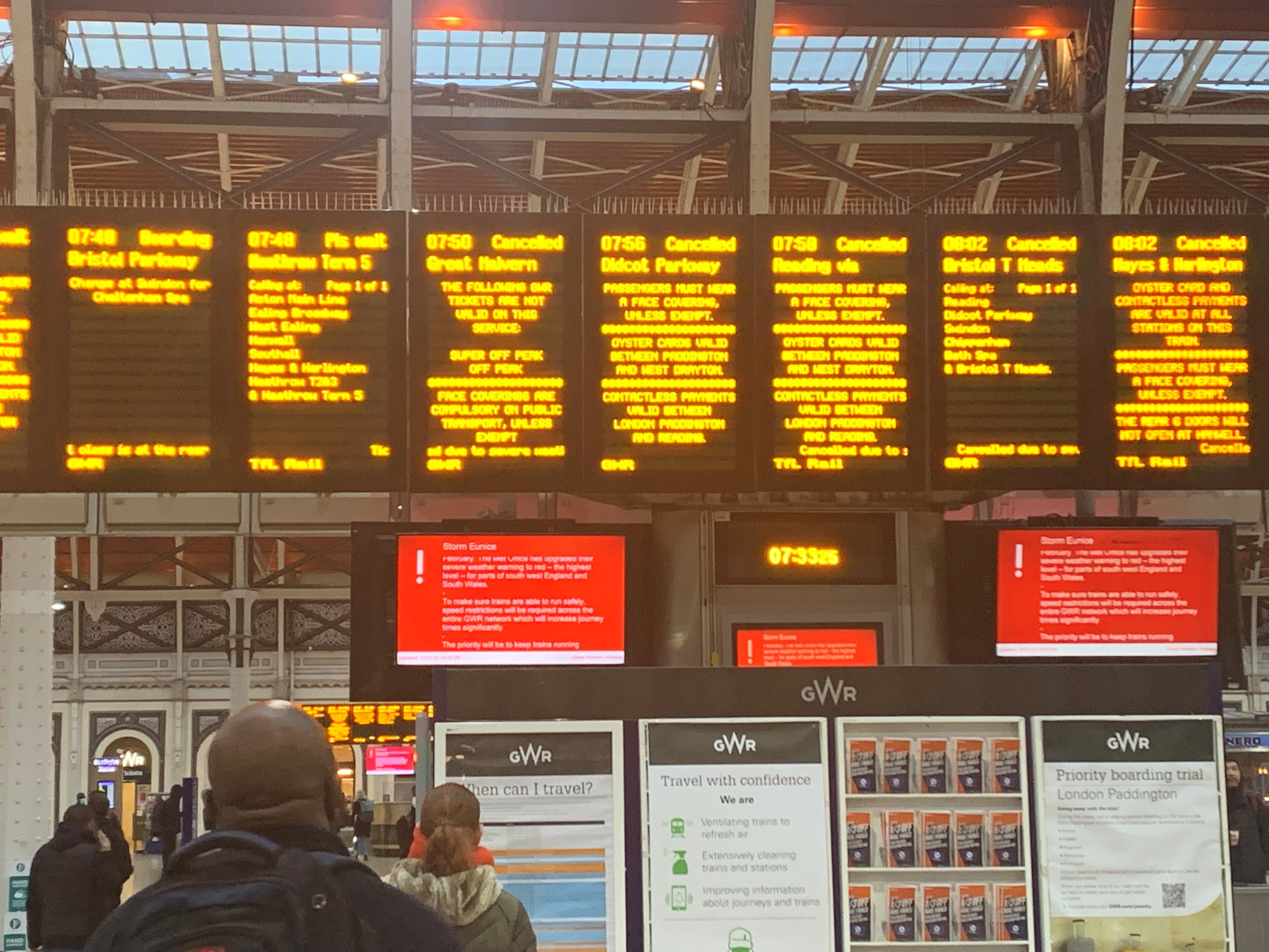A sign at London’s Paddington station shows cancelled trains after Storm Eunice hit the south coast (Pete Clifton/PA)
