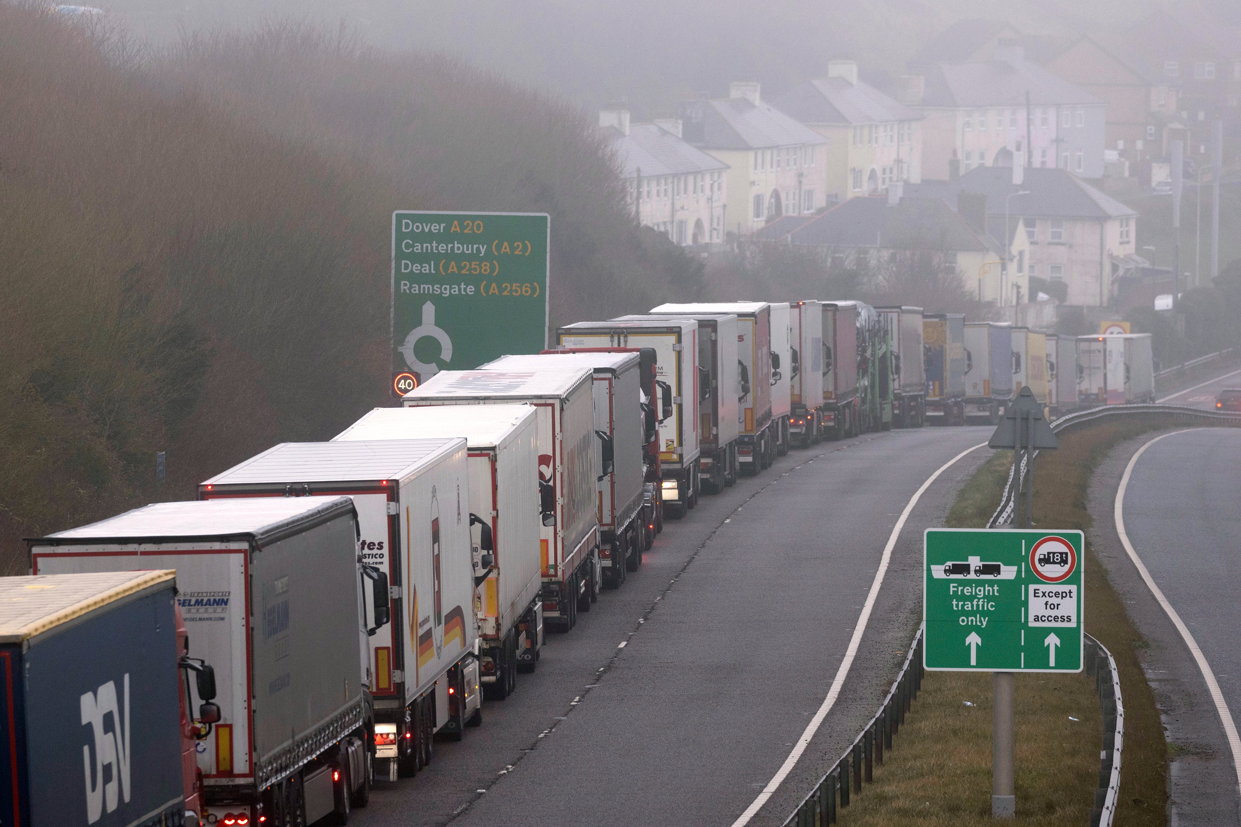 Lorries queue in the fog on the A20 into Dover Port on January 11, 2022 in Dover