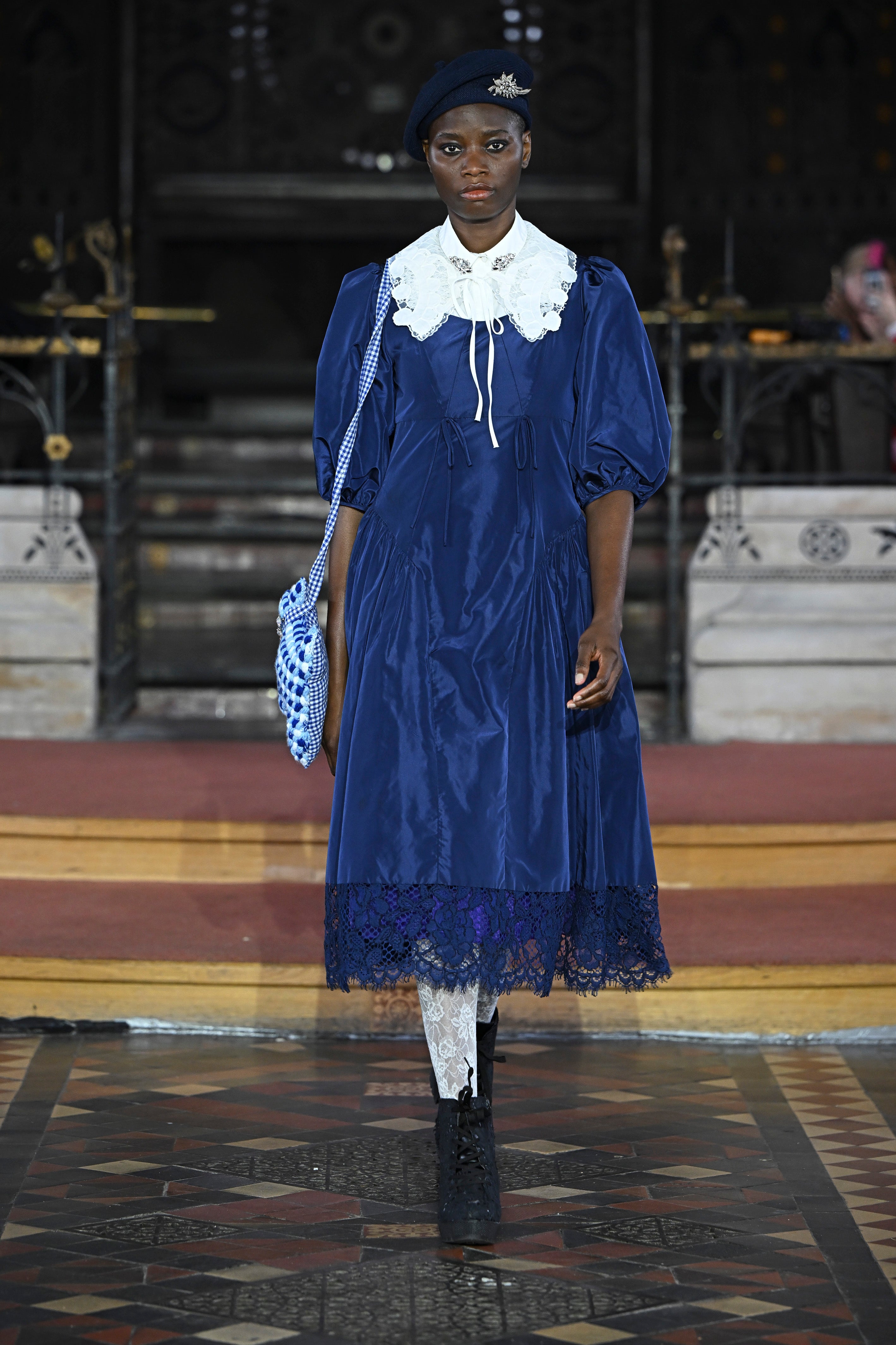 Peter Pan collars and berets featured prominently in the collection