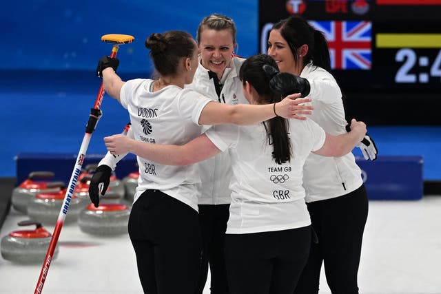<p>Eve Muirhead and Team GB celebrate their dramatic victory on an extra end  </p>