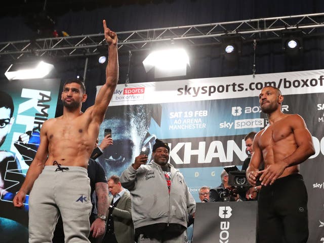 <p>Amir Khan (left) and Kell Brook after successfully making weight</p>